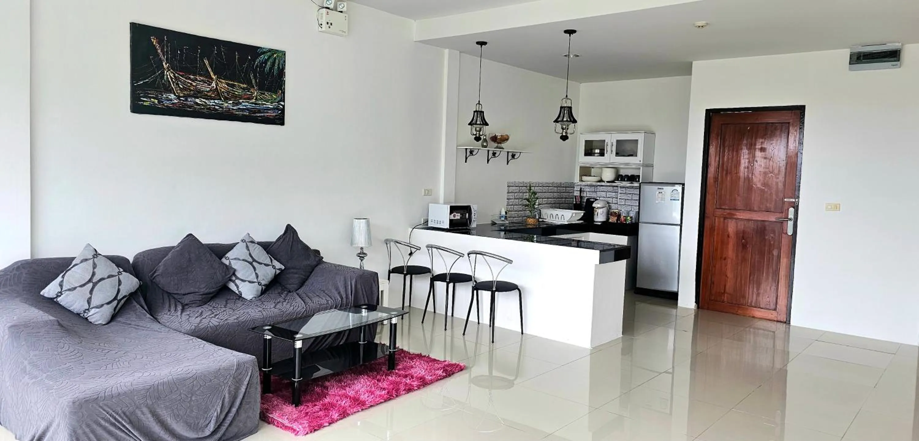 Kitchen or kitchenette in AM Surin Place - SHA Extra Plus