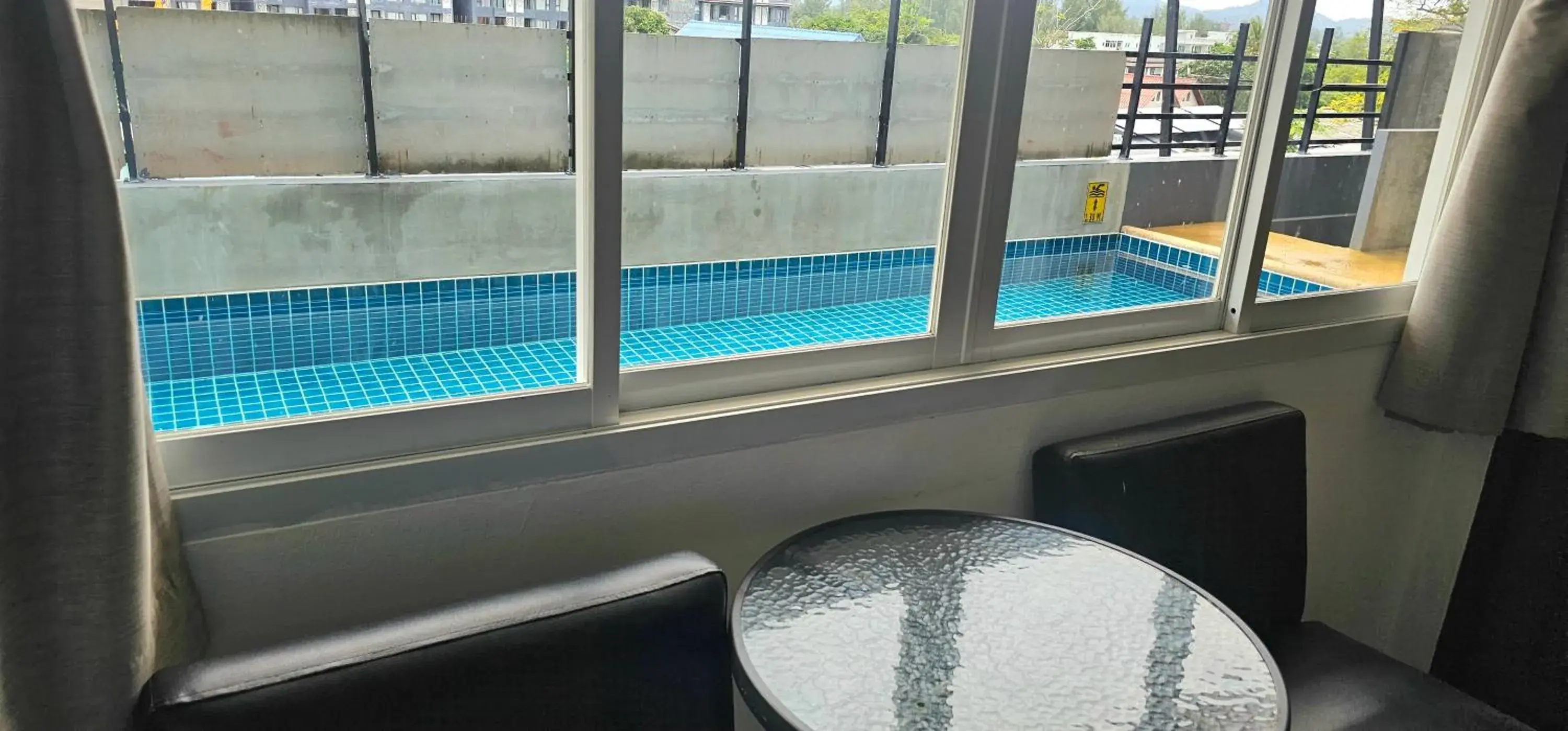 Pool view in AM Surin Place - SHA Extra Plus Pool view in AM Surin Place - SHA Extra Plus