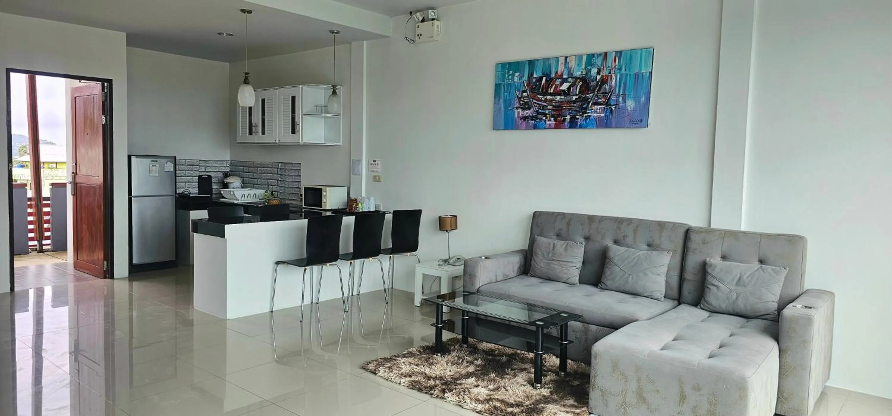 Kitchen or kitchenette in AM Surin Place - SHA Extra Plus