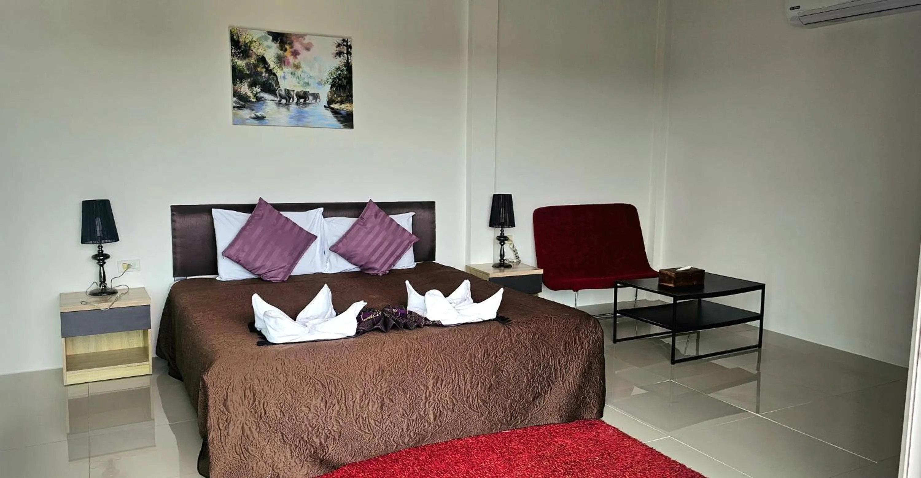 Photo of the whole room, Bed in AM Surin Place - SHA Extra Plus