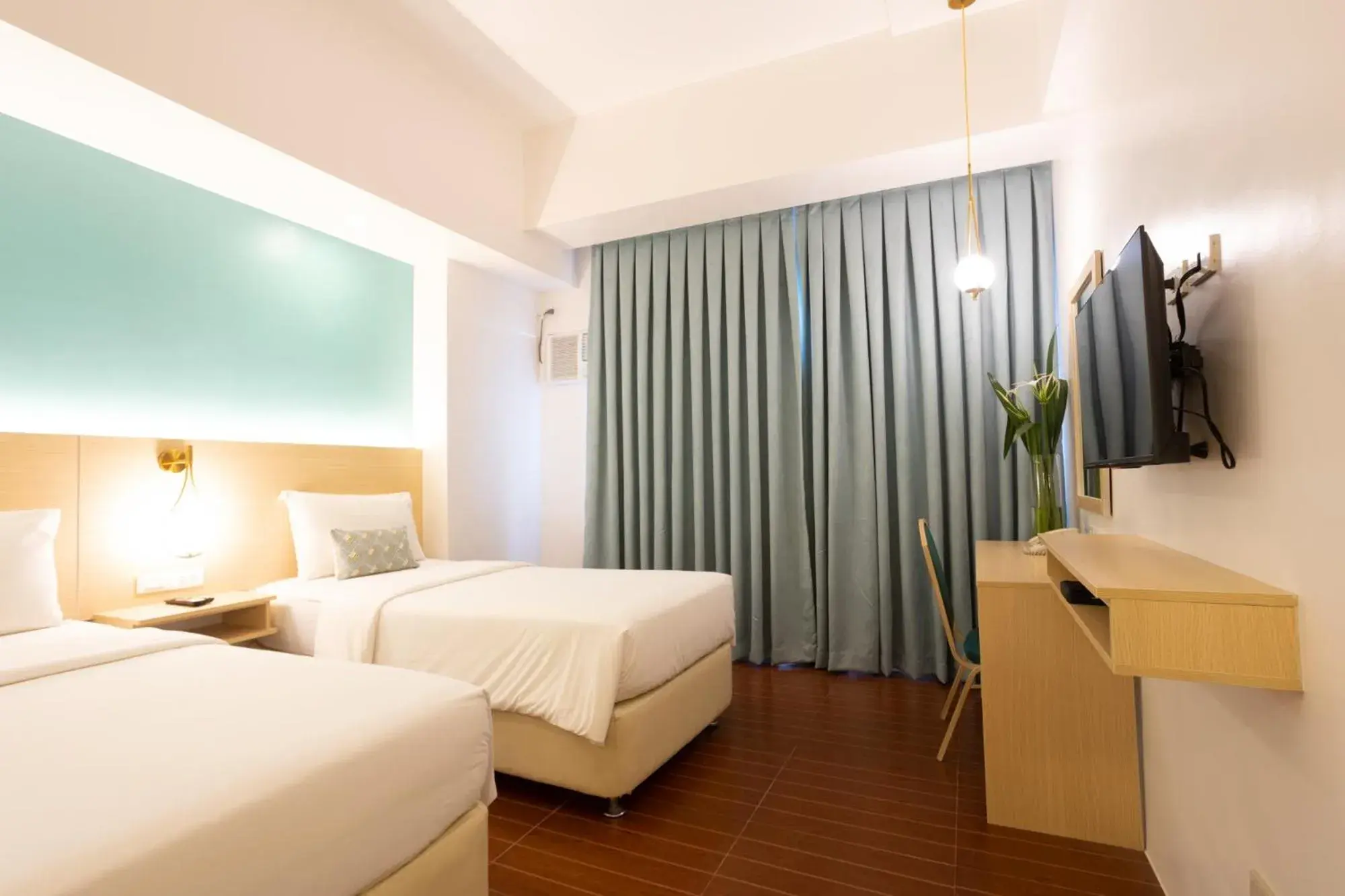 Bed in Allure Hotel & Suites Bed in Allure Hotel & Suites