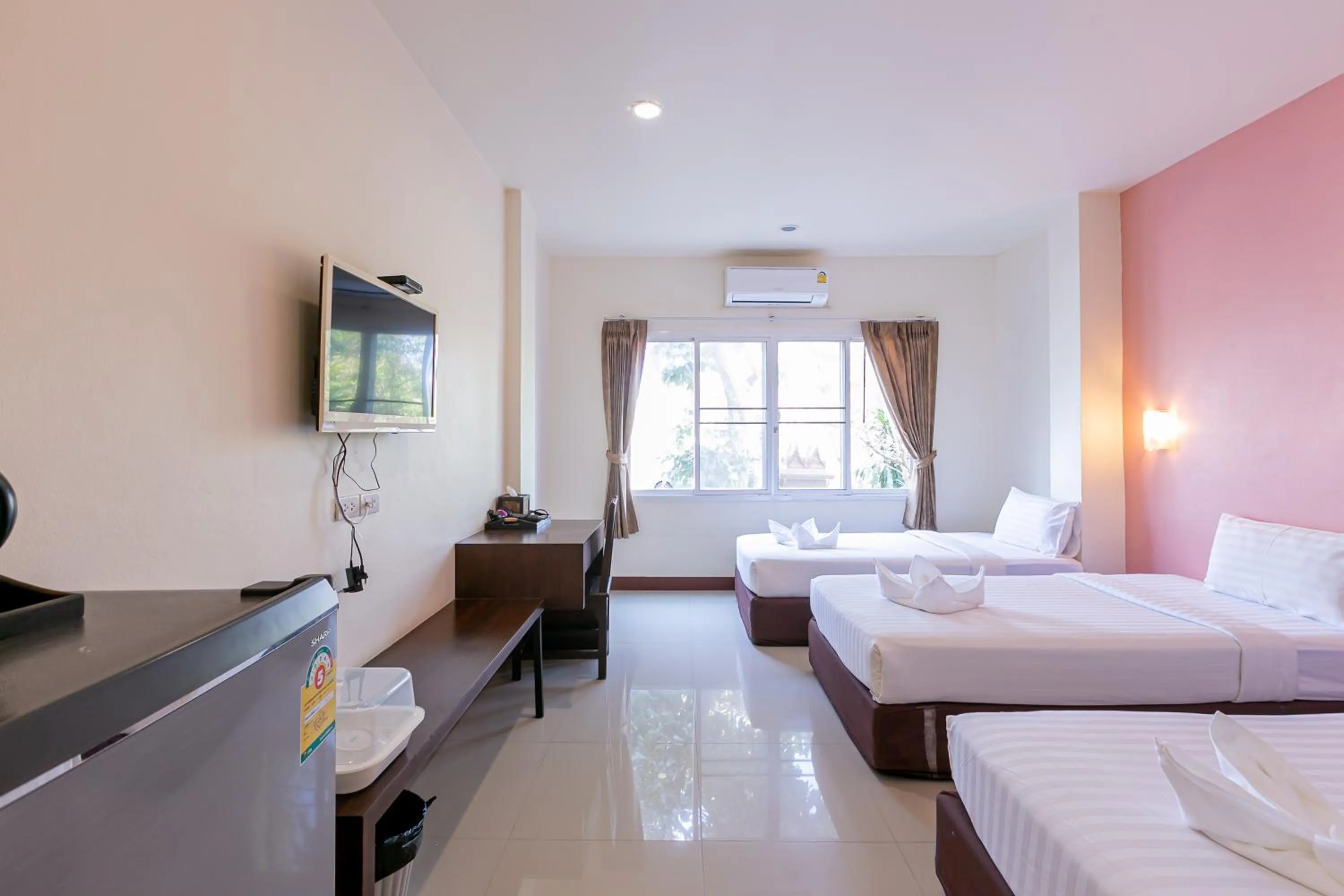 Bed in Panwalee Hotel