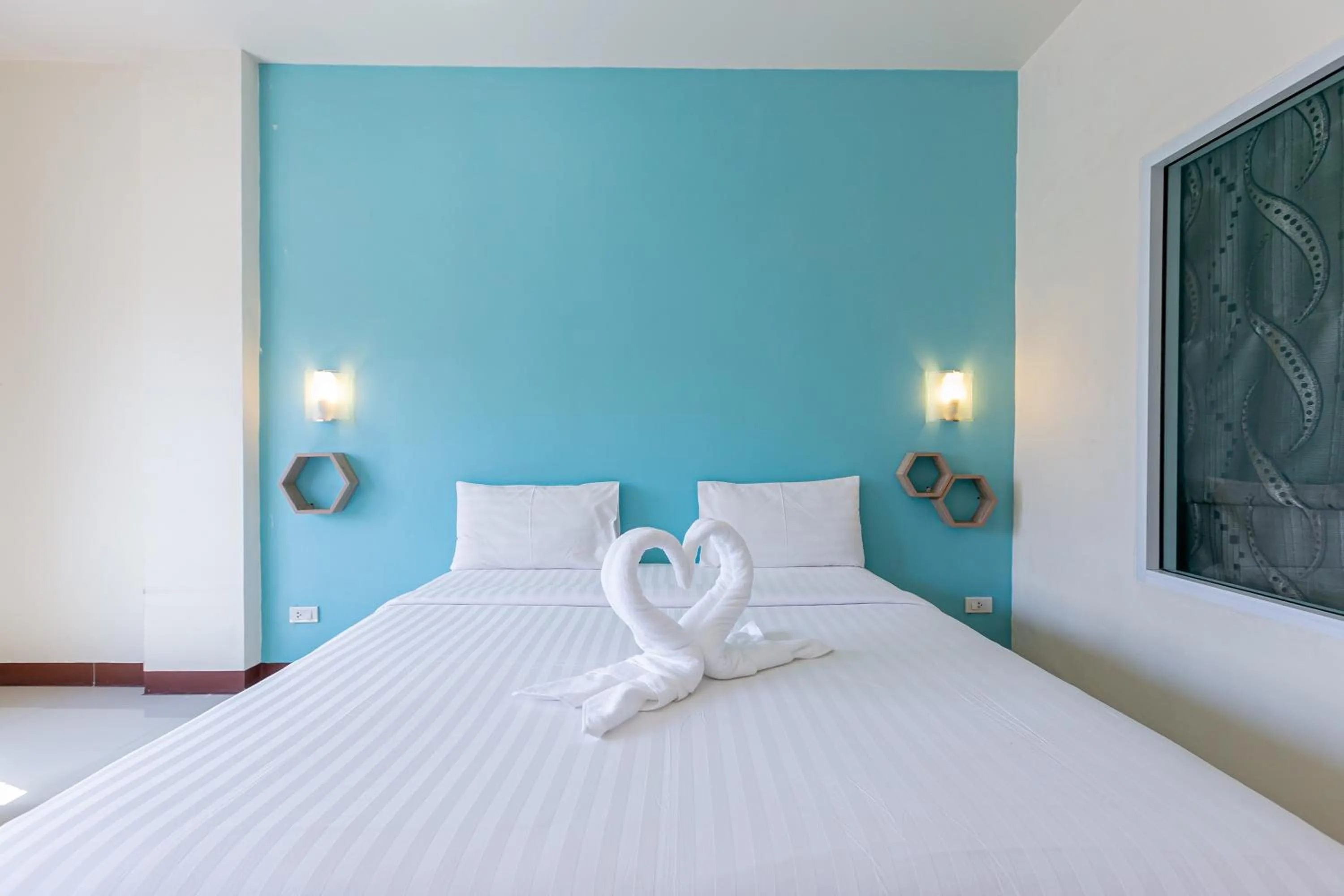 Bed in Panwalee Hotel