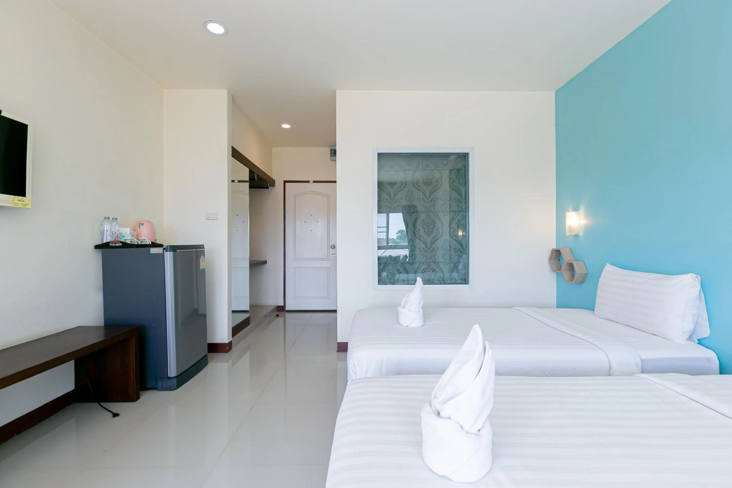 Bed in Panwalee Hotel