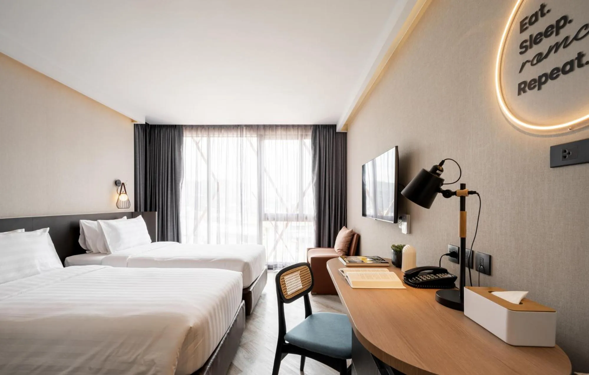 Bed in Seekers Finders Rama IV Hotel SureStay Collection by BW