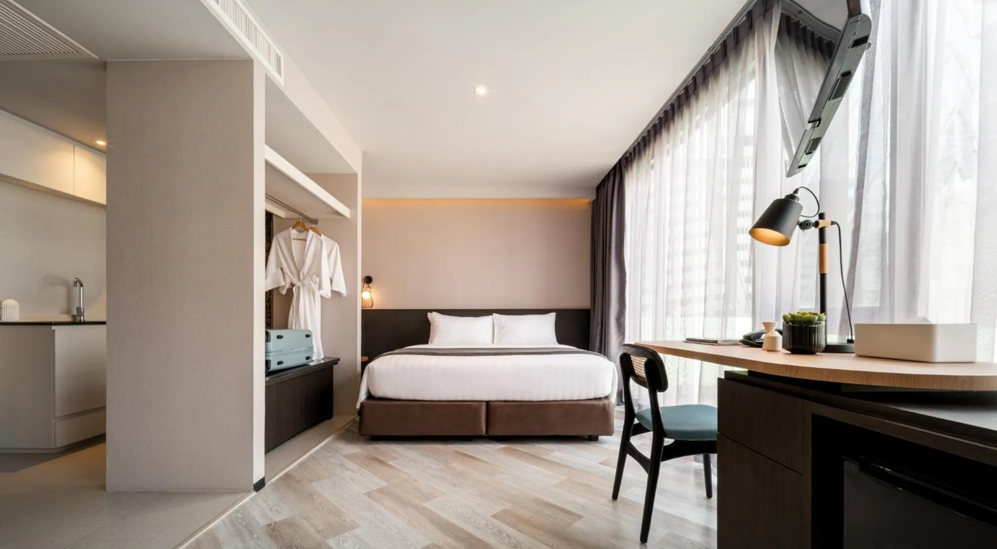 Bed in Seekers Finders Rama IV Hotel SureStay Collection by BW