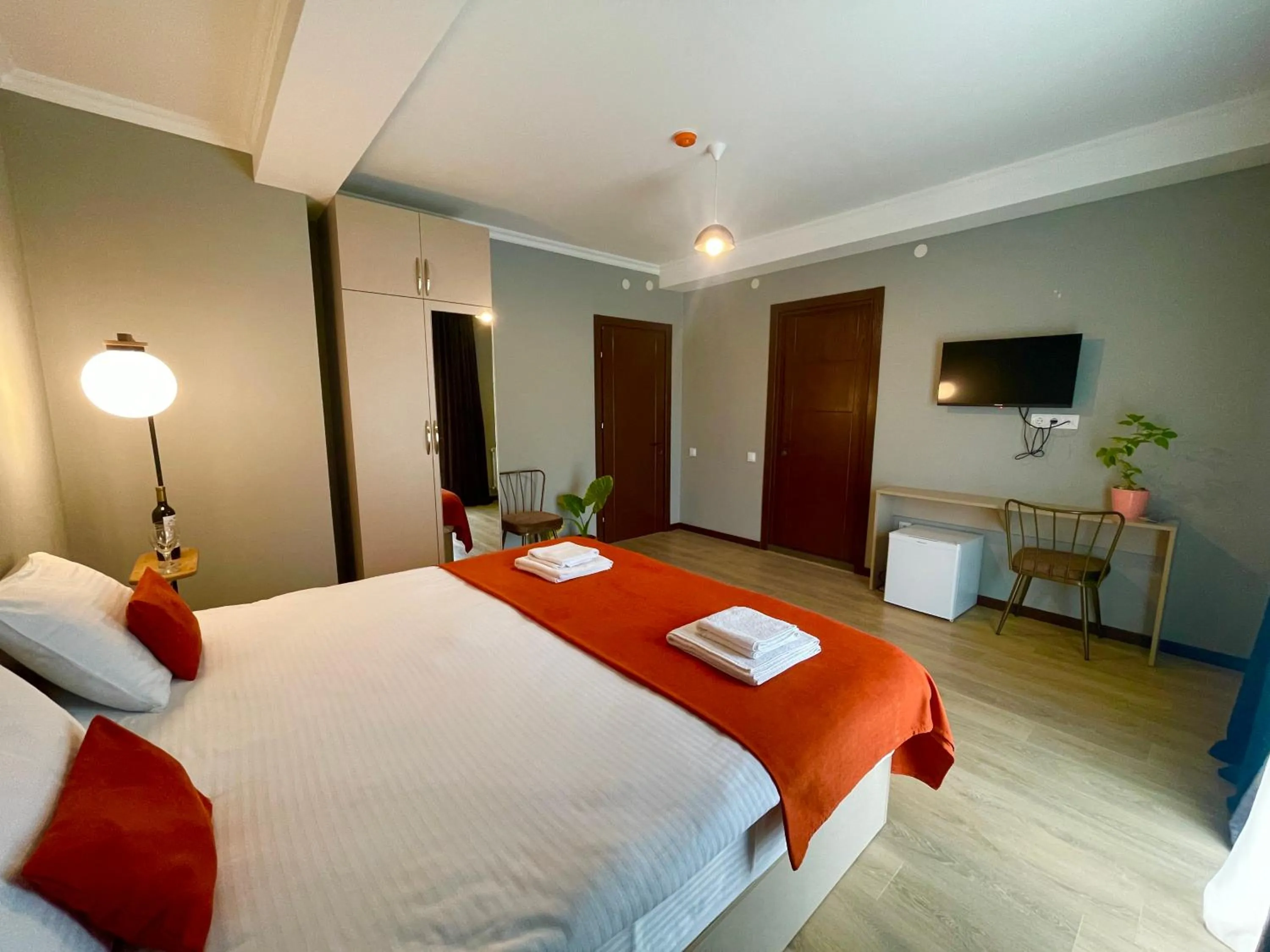 Communal lounge/ TV room, Bed in Holiday Borjomi