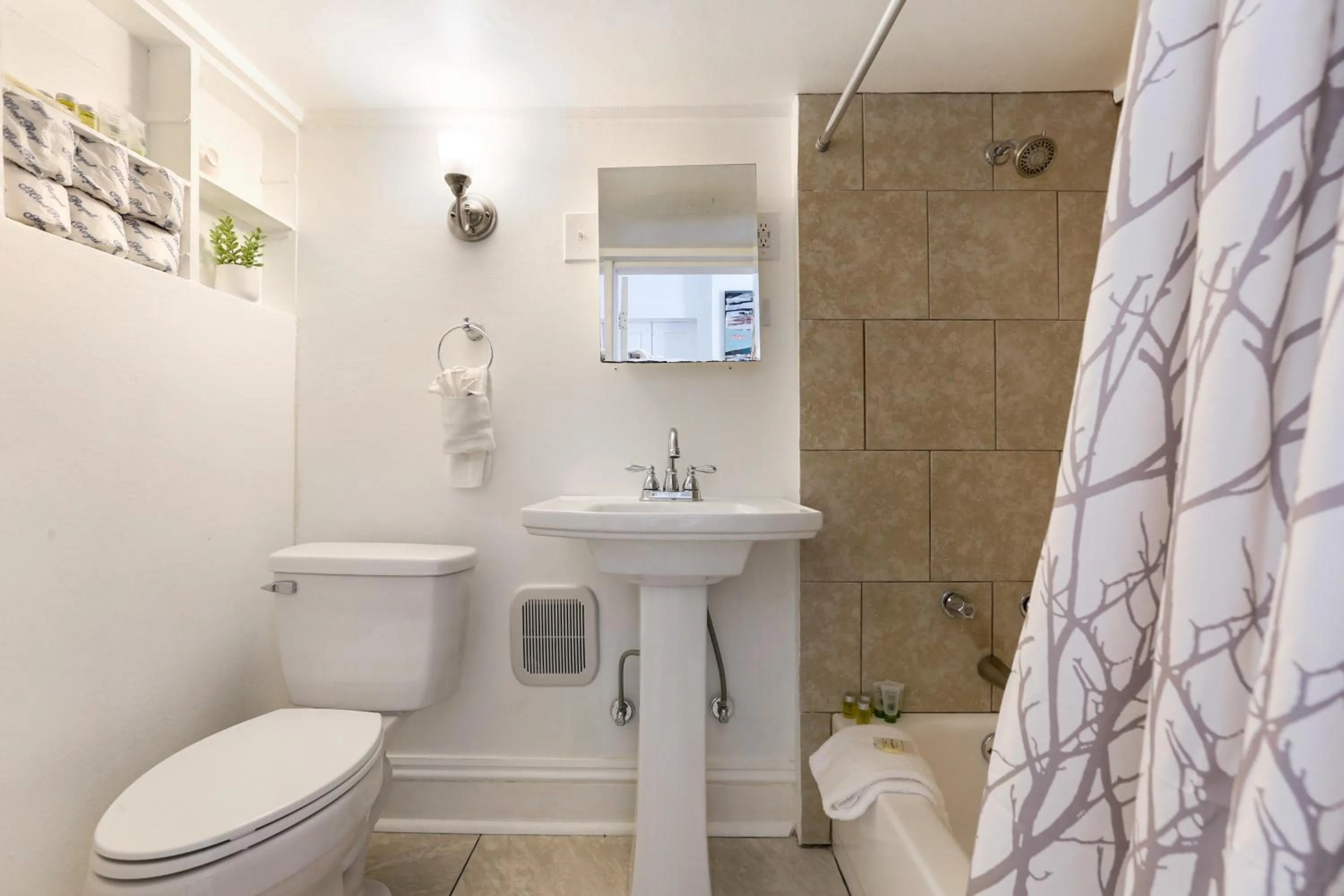 Bathroom in Uptown Spacious 4BD/3BA with Historic Charm