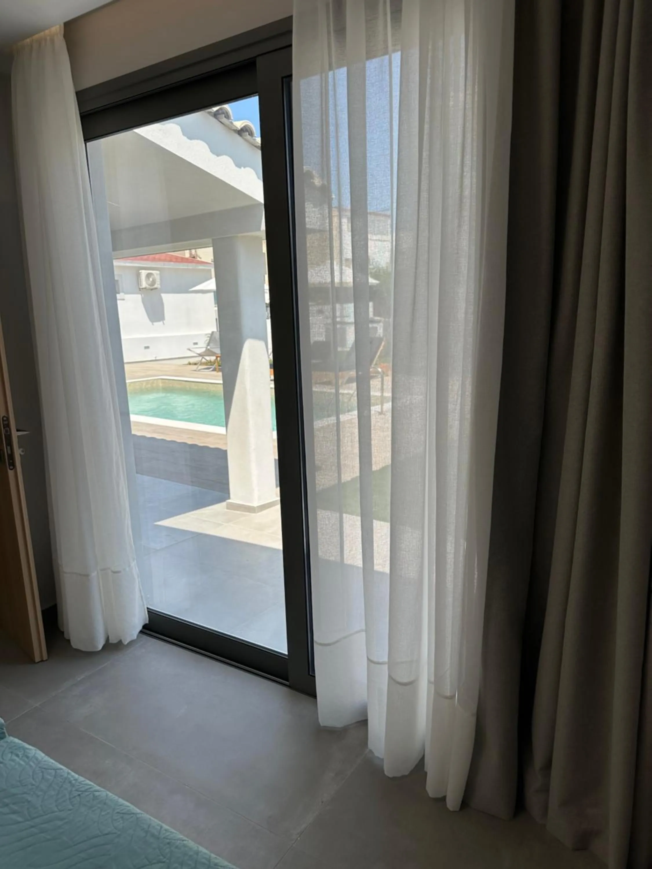 Bed in Evdokia Suites