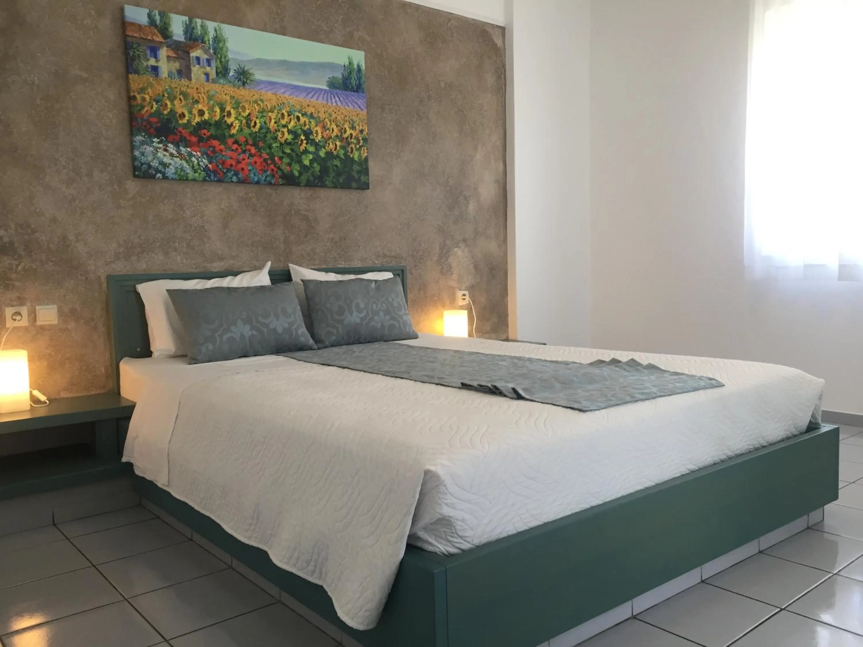 Bed in Evdokia Suites