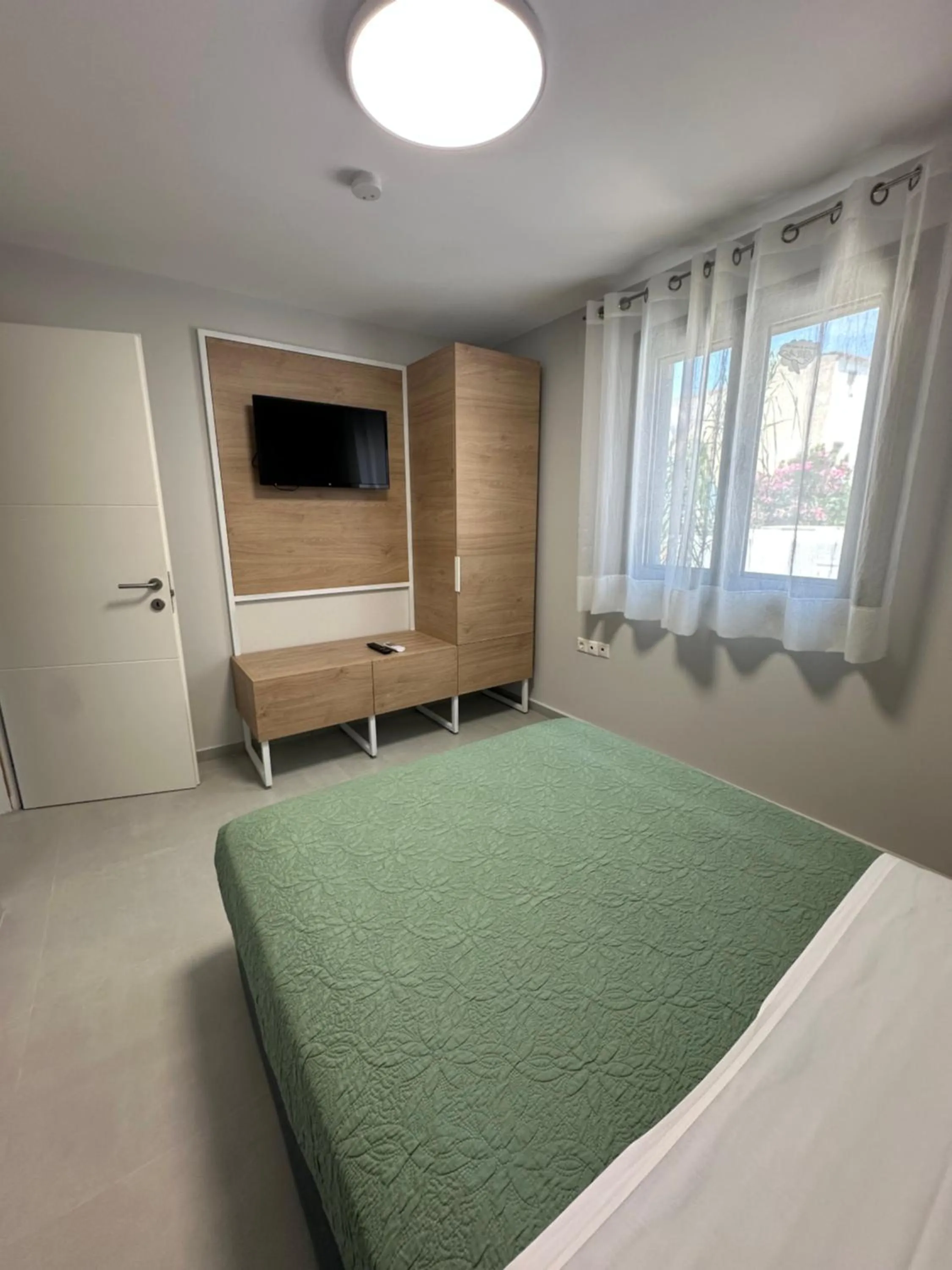 Bed in Evdokia Suites