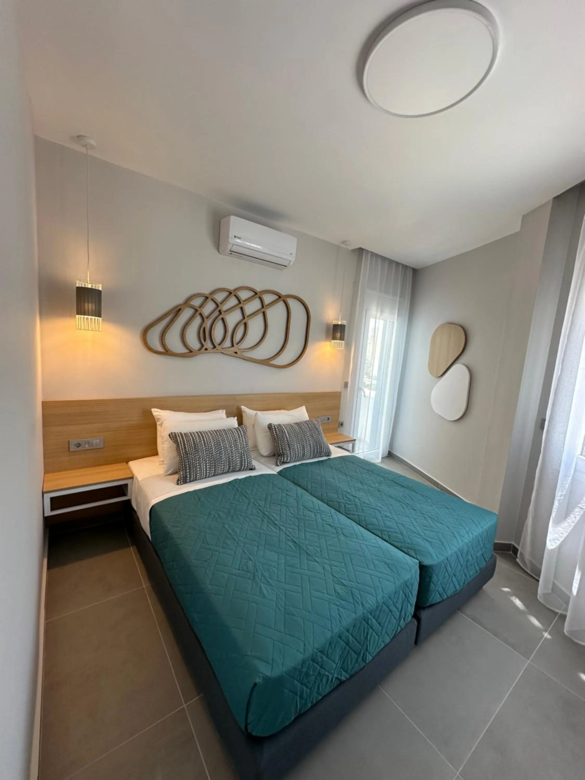 Bed in Evdokia Suites