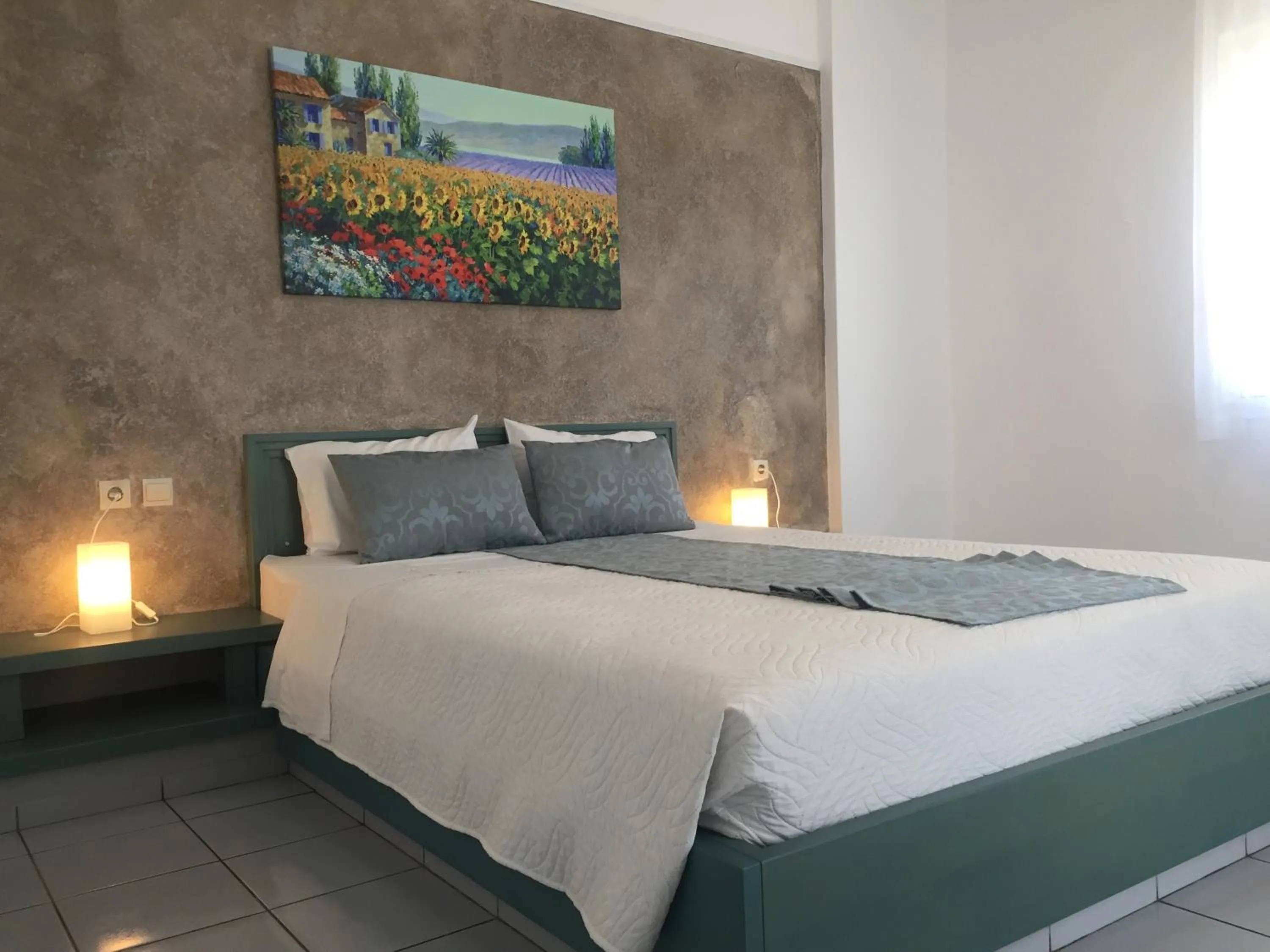 Bed in Evdokia Suites