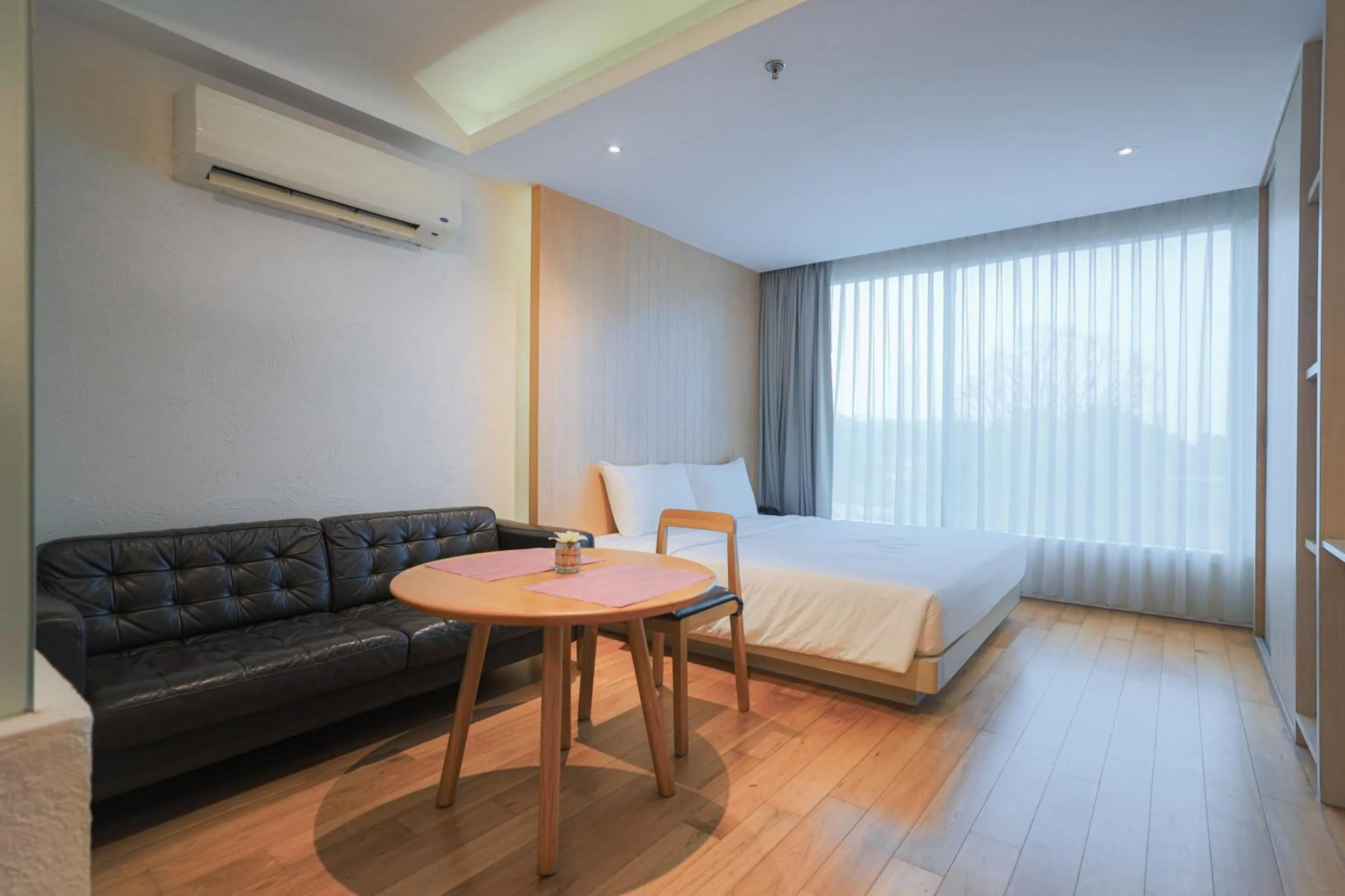 Bed in Balcony Seaside Sriracha Hotel & Serviced Apartments