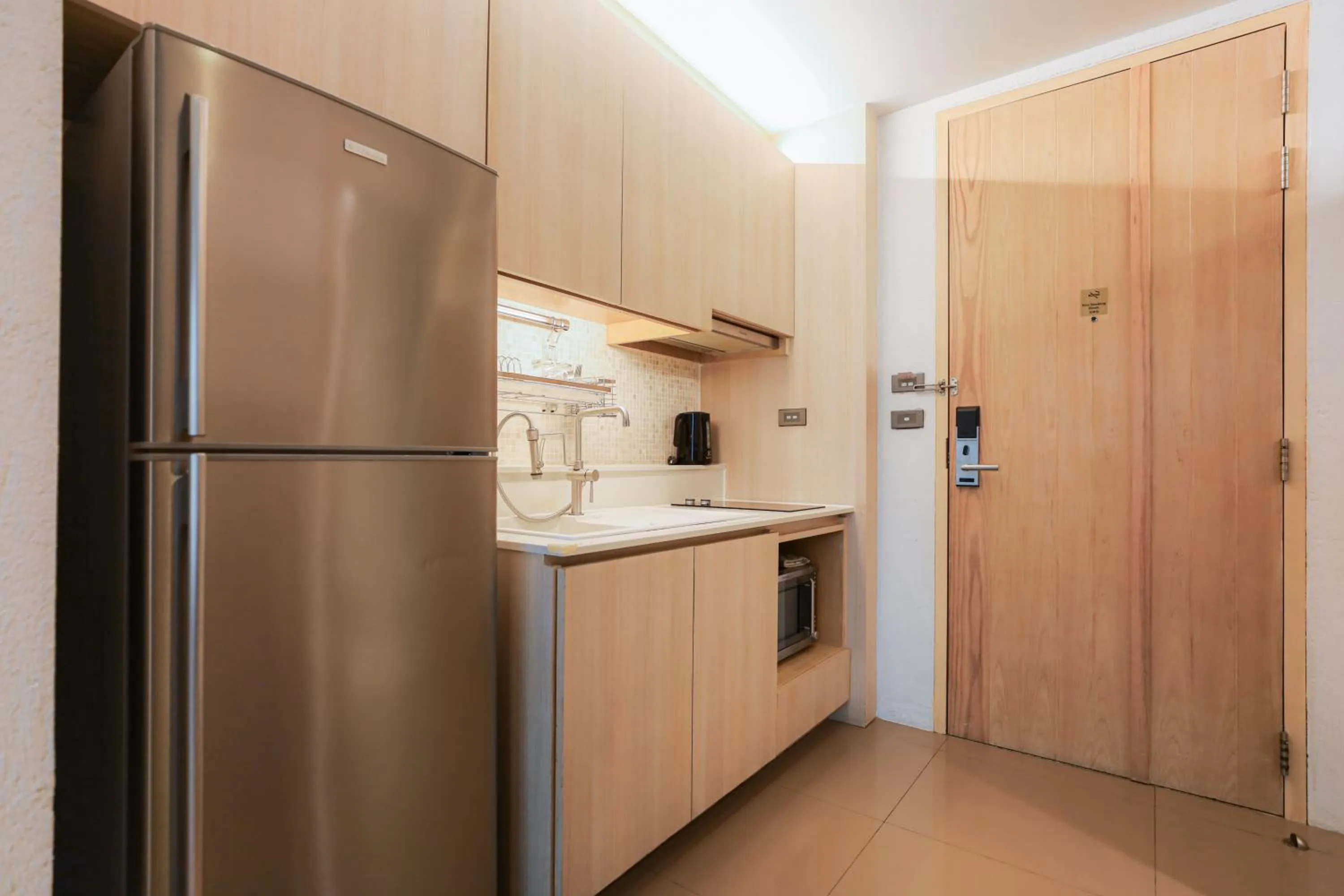 Kitchen or kitchenette in Balcony Seaside Sriracha Hotel & Serviced Apartments
