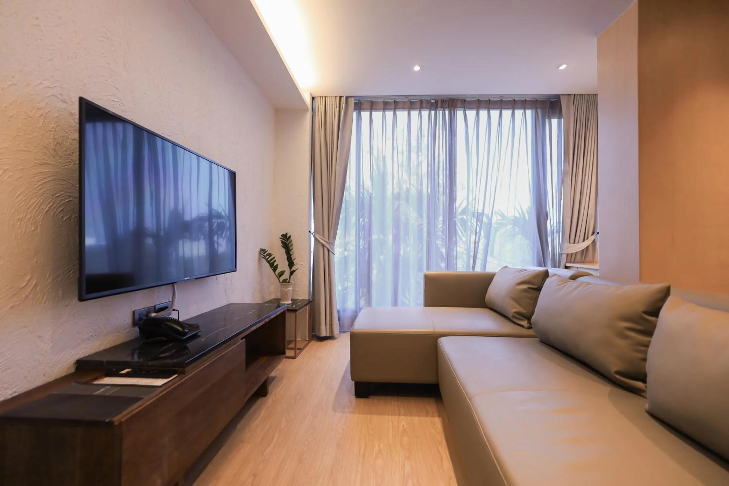 TV and multimedia in Balcony Seaside Sriracha Hotel & Serviced Apartments