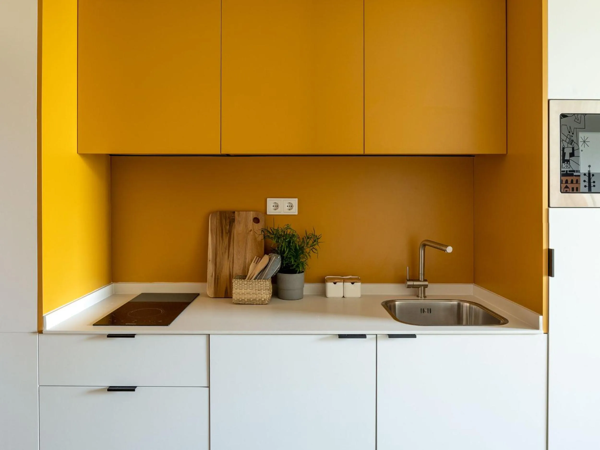 Kitchen or kitchenette in Kora Green City - Aparthotel Passivhaus