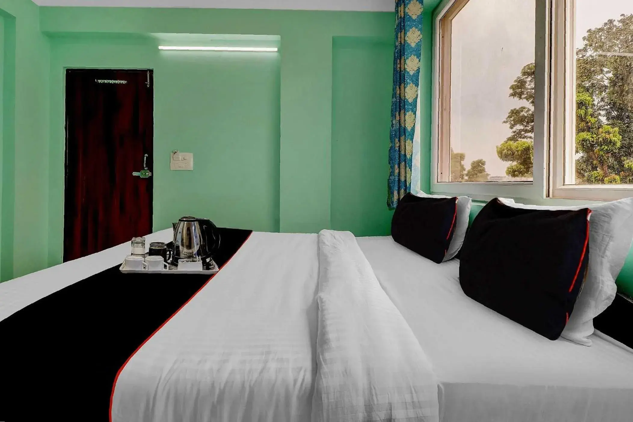 Bedroom, Bed in Super Collection O The Kailash Hotel Bedroom, Bed in Super Collection O The Kailash Hotel