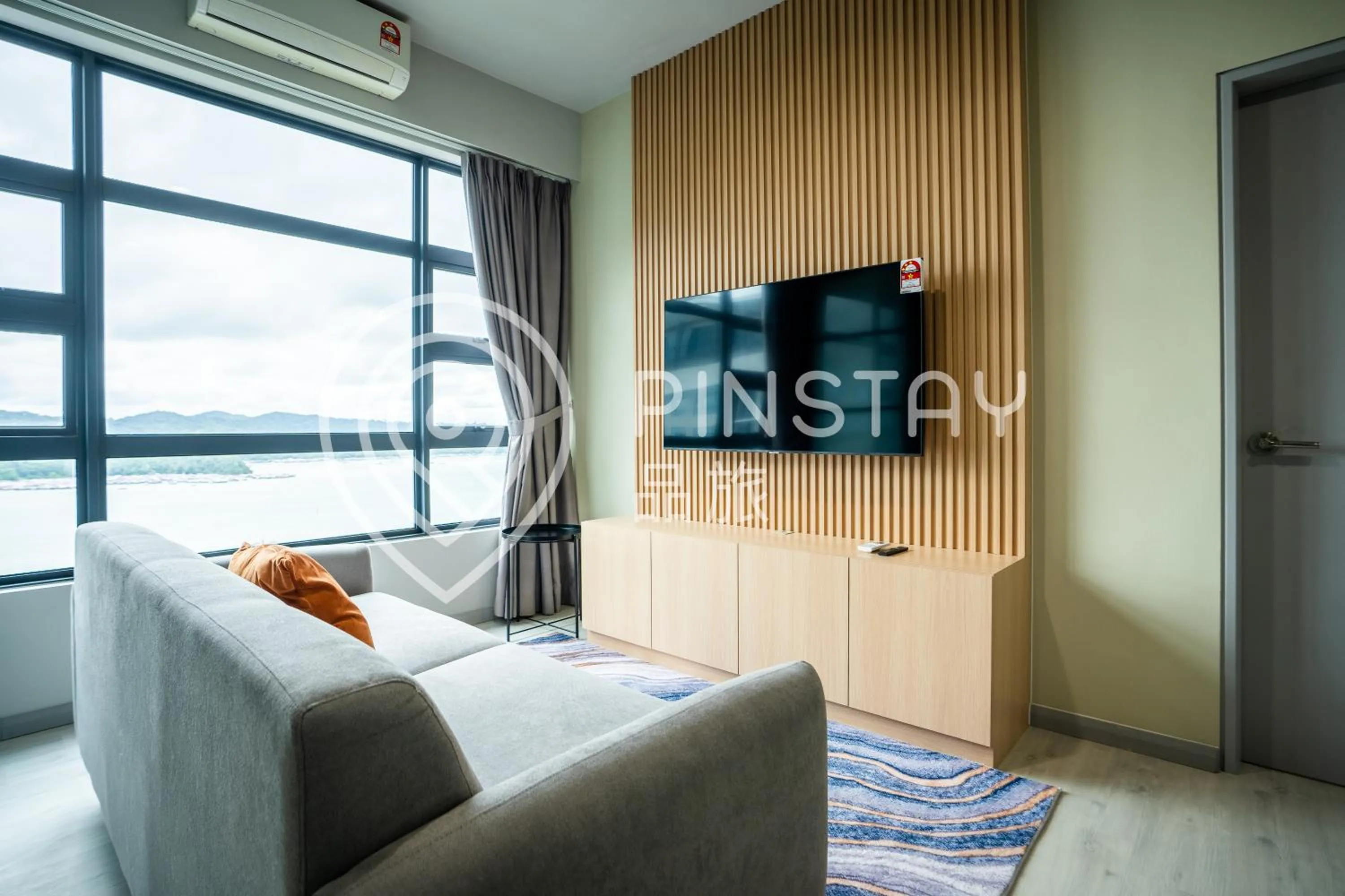 Living room in Jesselton Quay by Pinstay