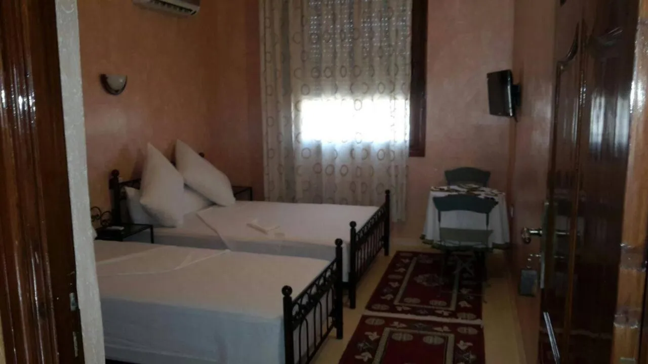 Bed in Hotel Espace Tifawine