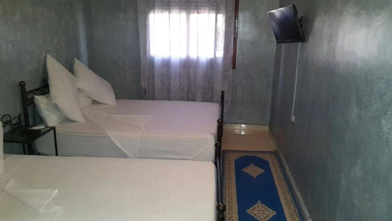 Bed in Hotel Espace Tifawine