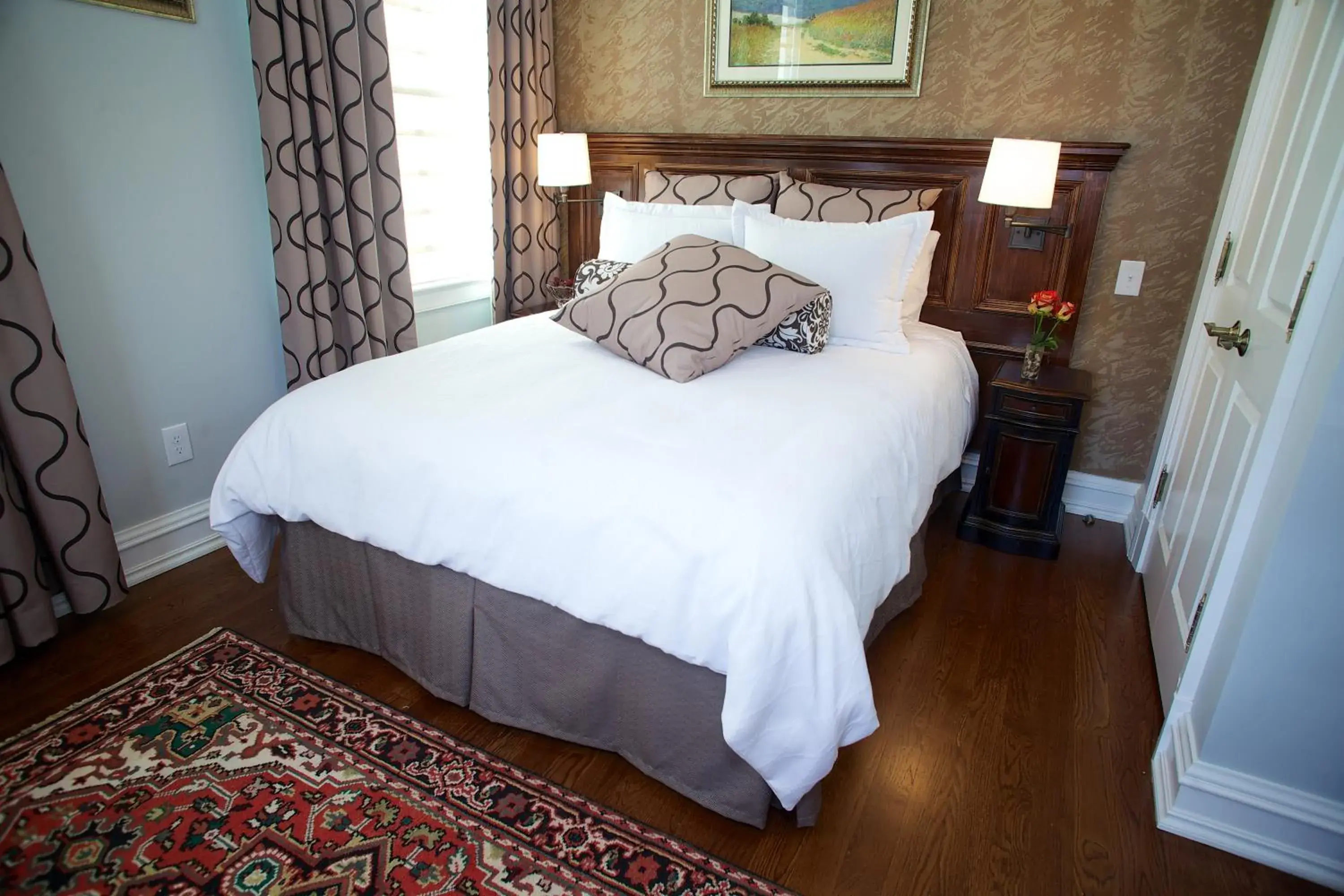 Bed in Guest House at Norwalk Inn Bed in Guest House at Norwalk Inn