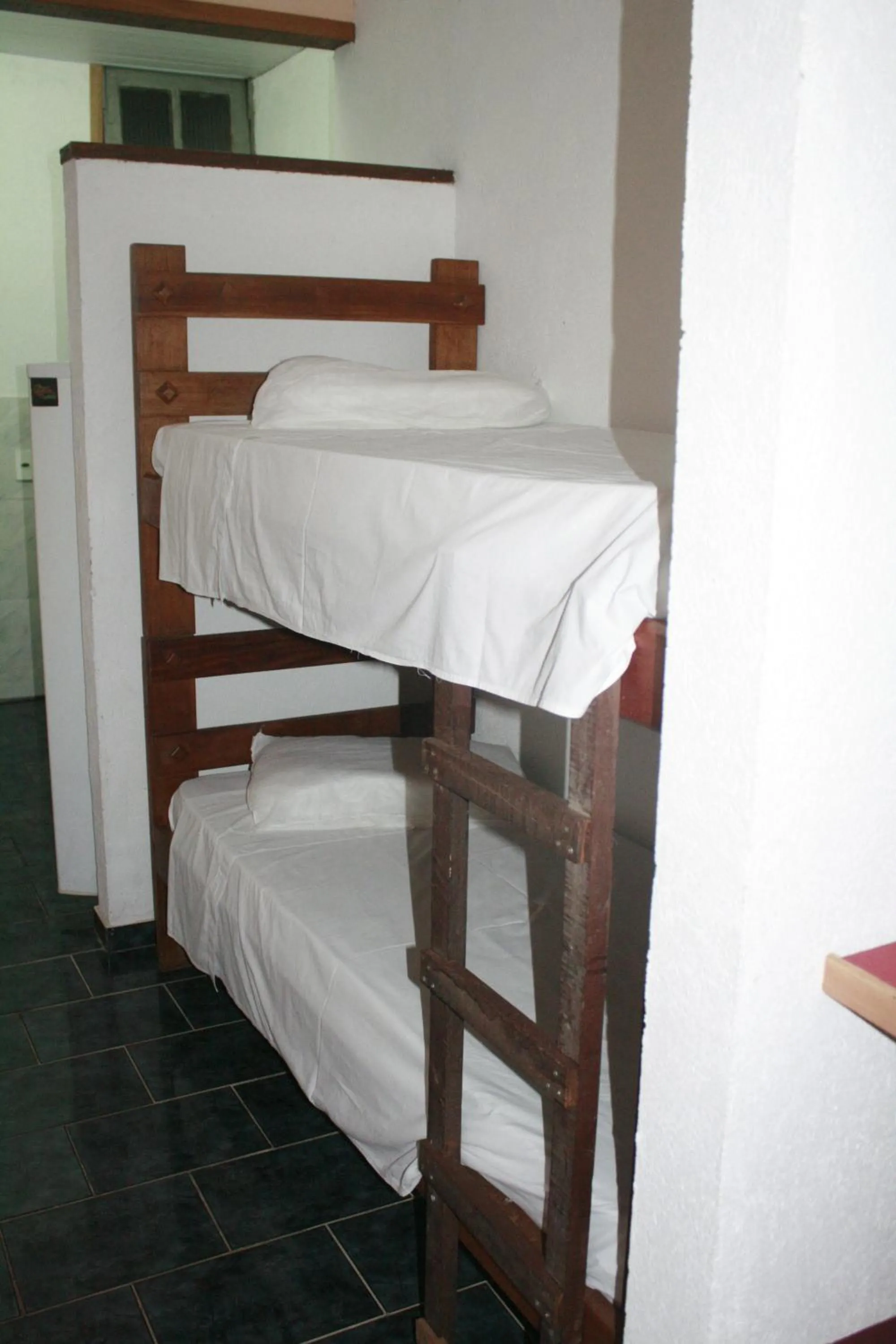 Bed in Pousada Zanzibar