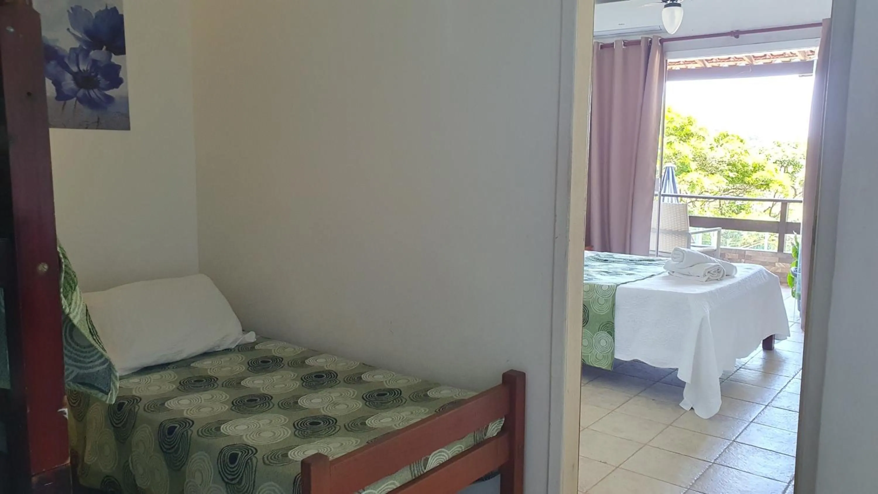 Bed in Pousada Zanzibar