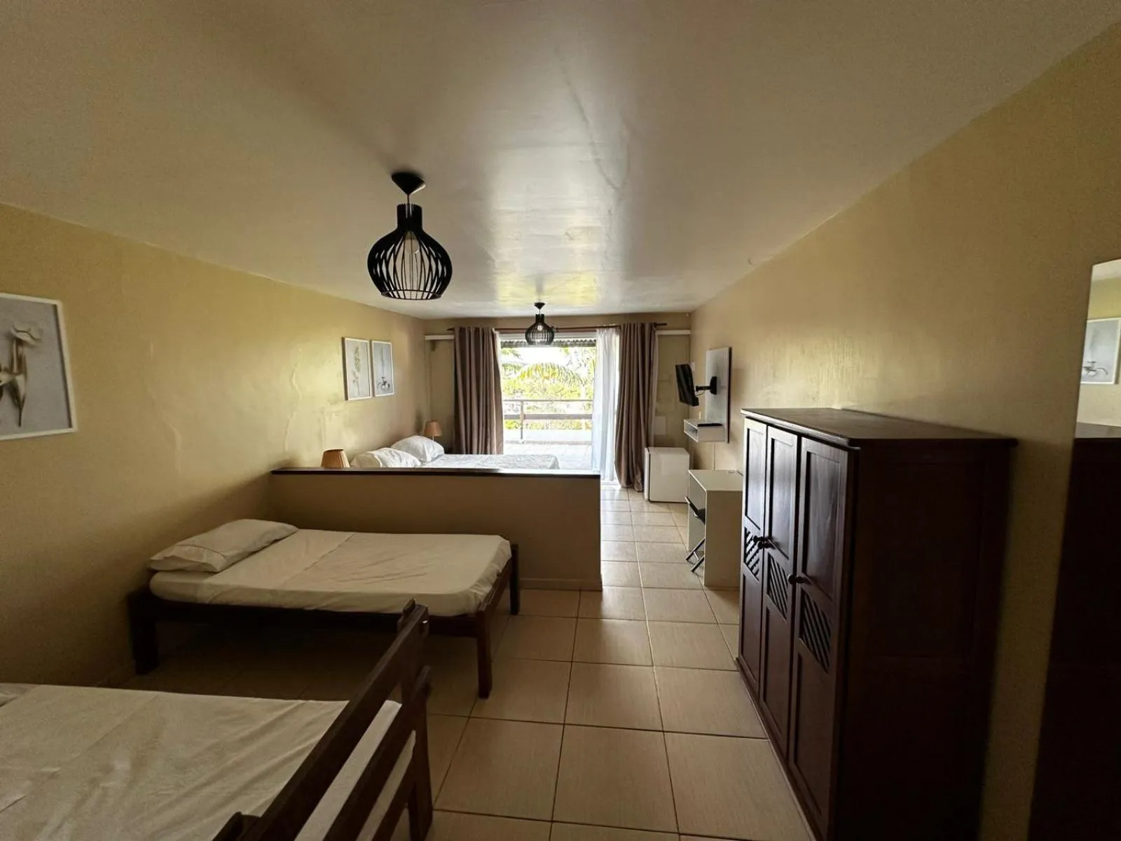 Photo of the whole room, Bed in Pousada Zanzibar