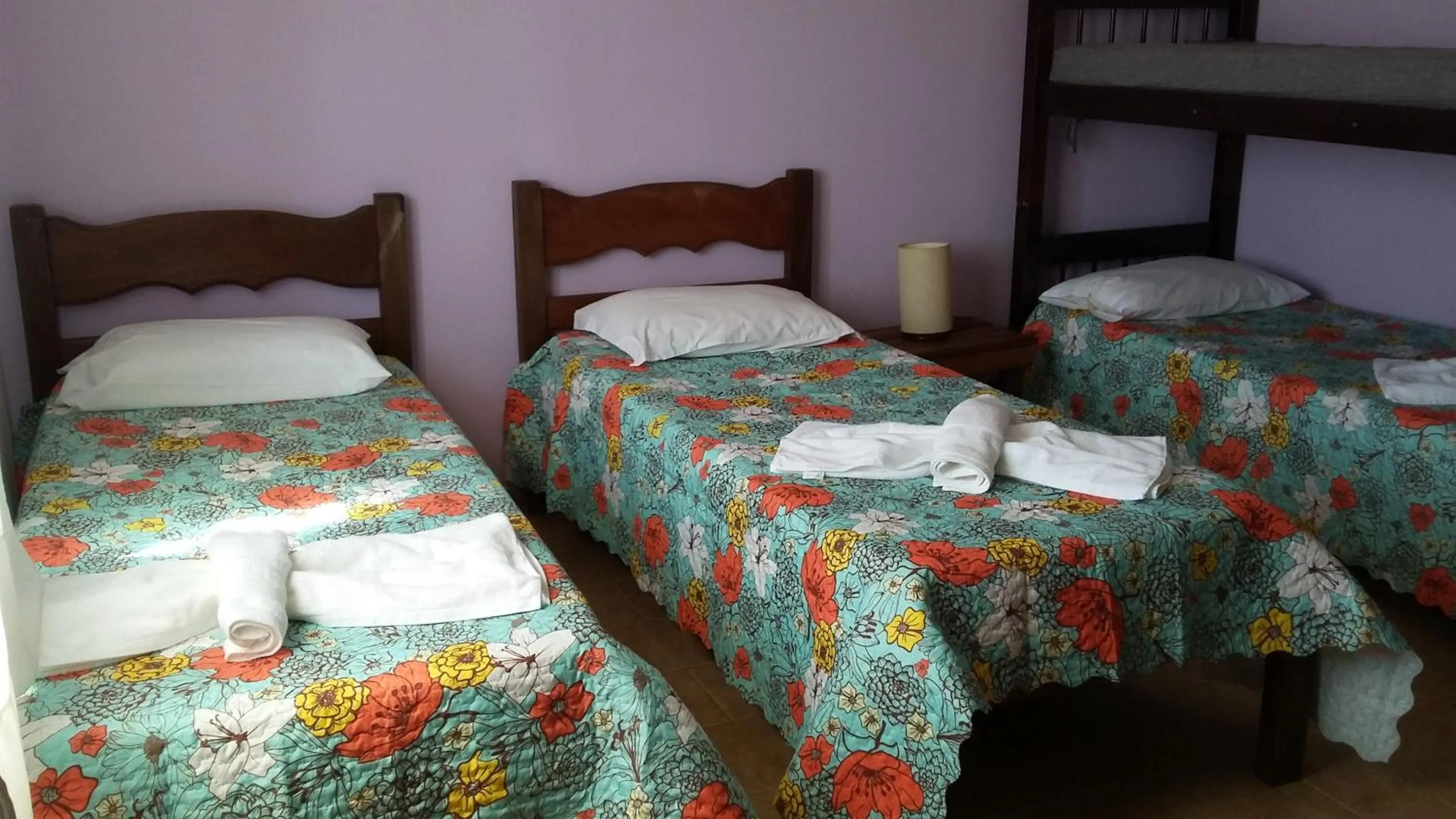 Bed in Pousada Zanzibar