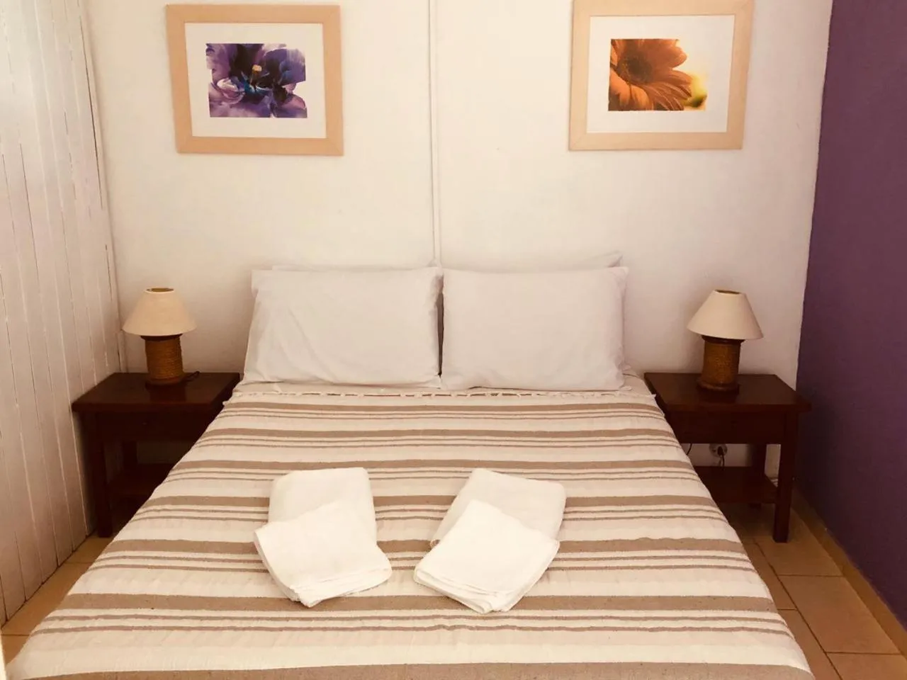 Bed in Pousada Zanzibar