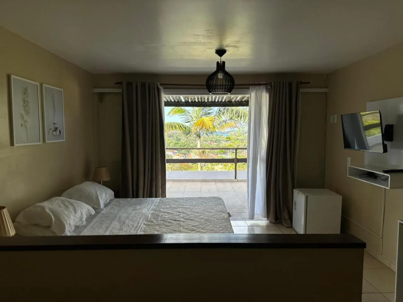 Photo of the whole room, Bed in Pousada Zanzibar