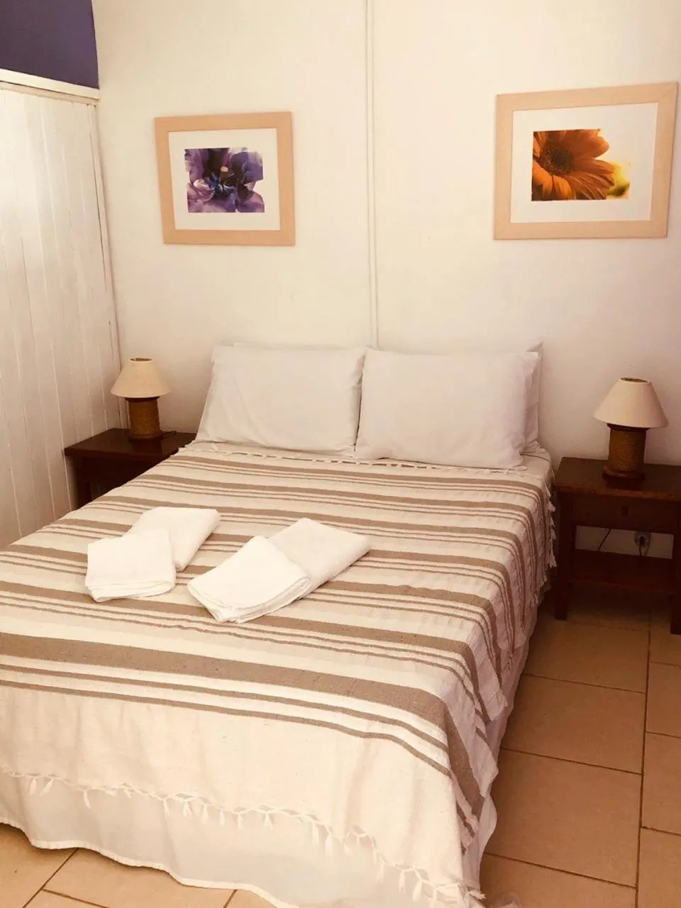 Bed in Pousada Zanzibar