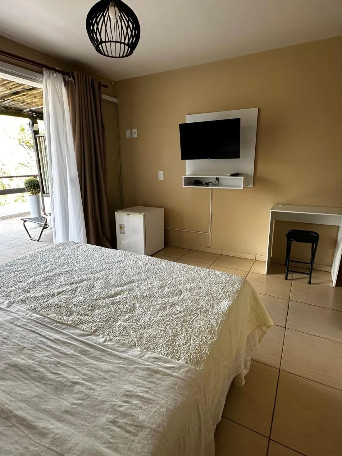 Photo of the whole room, Bed in Pousada Zanzibar