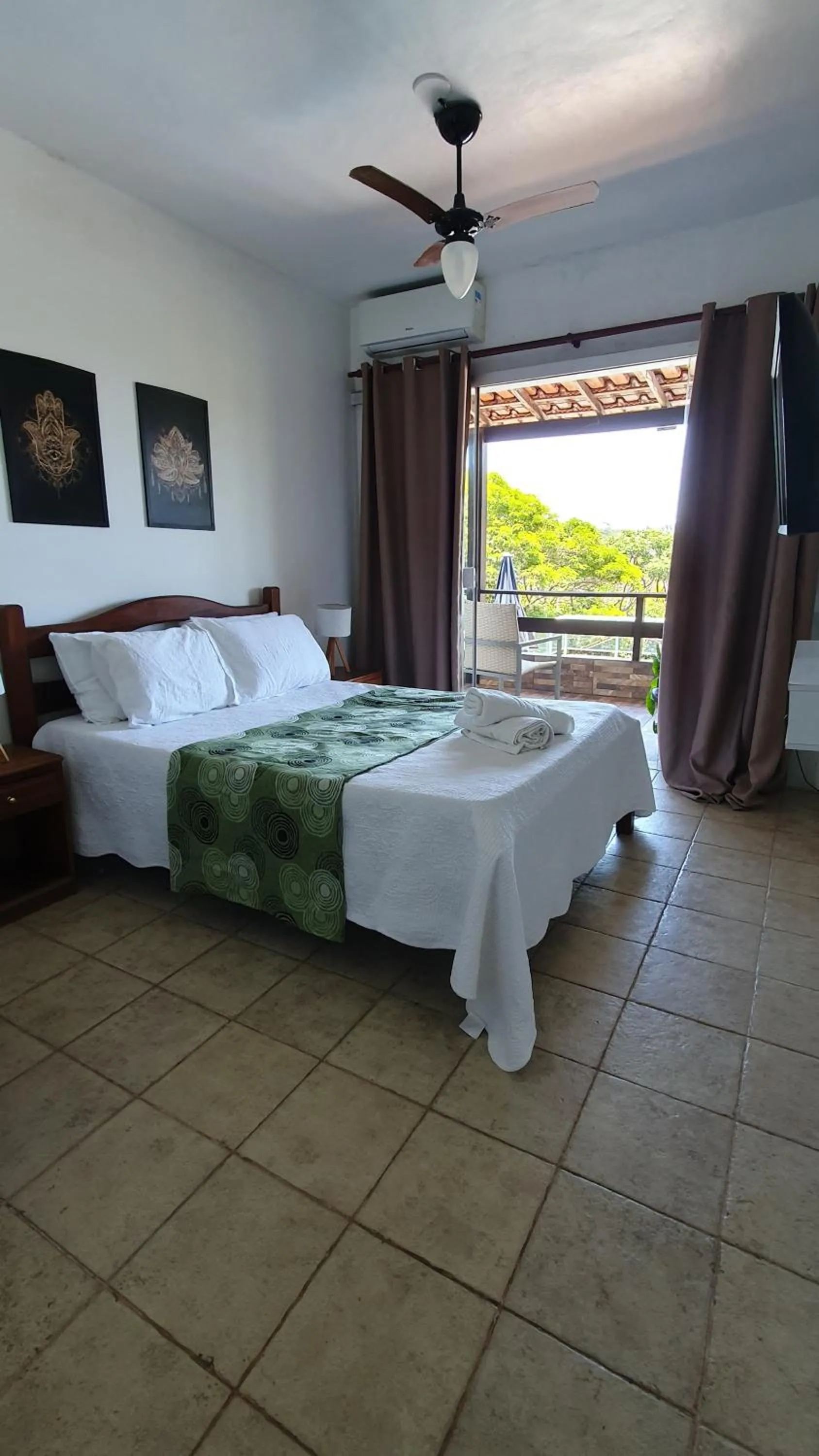 Bed in Pousada Zanzibar