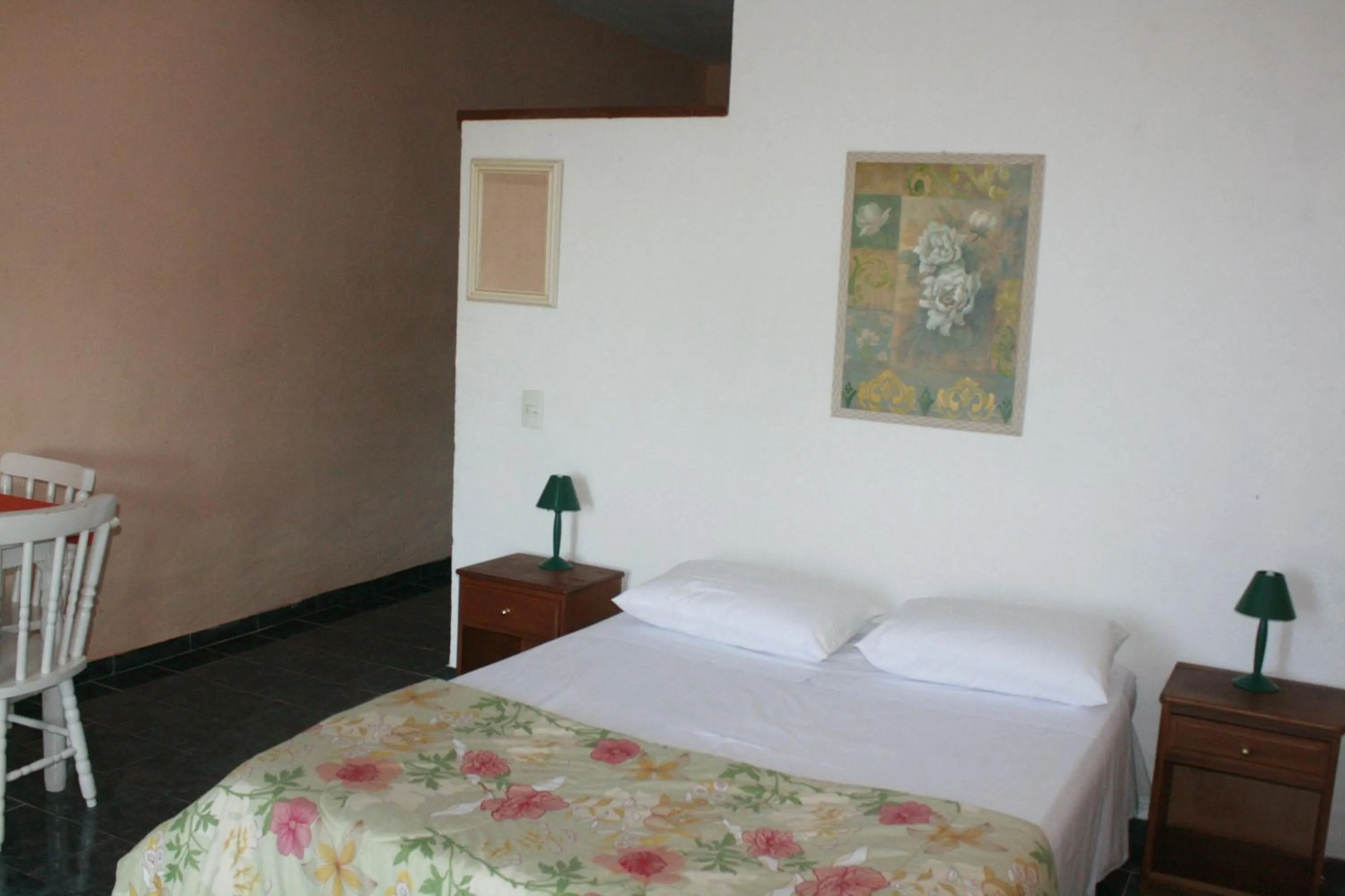 Bed in Pousada Zanzibar