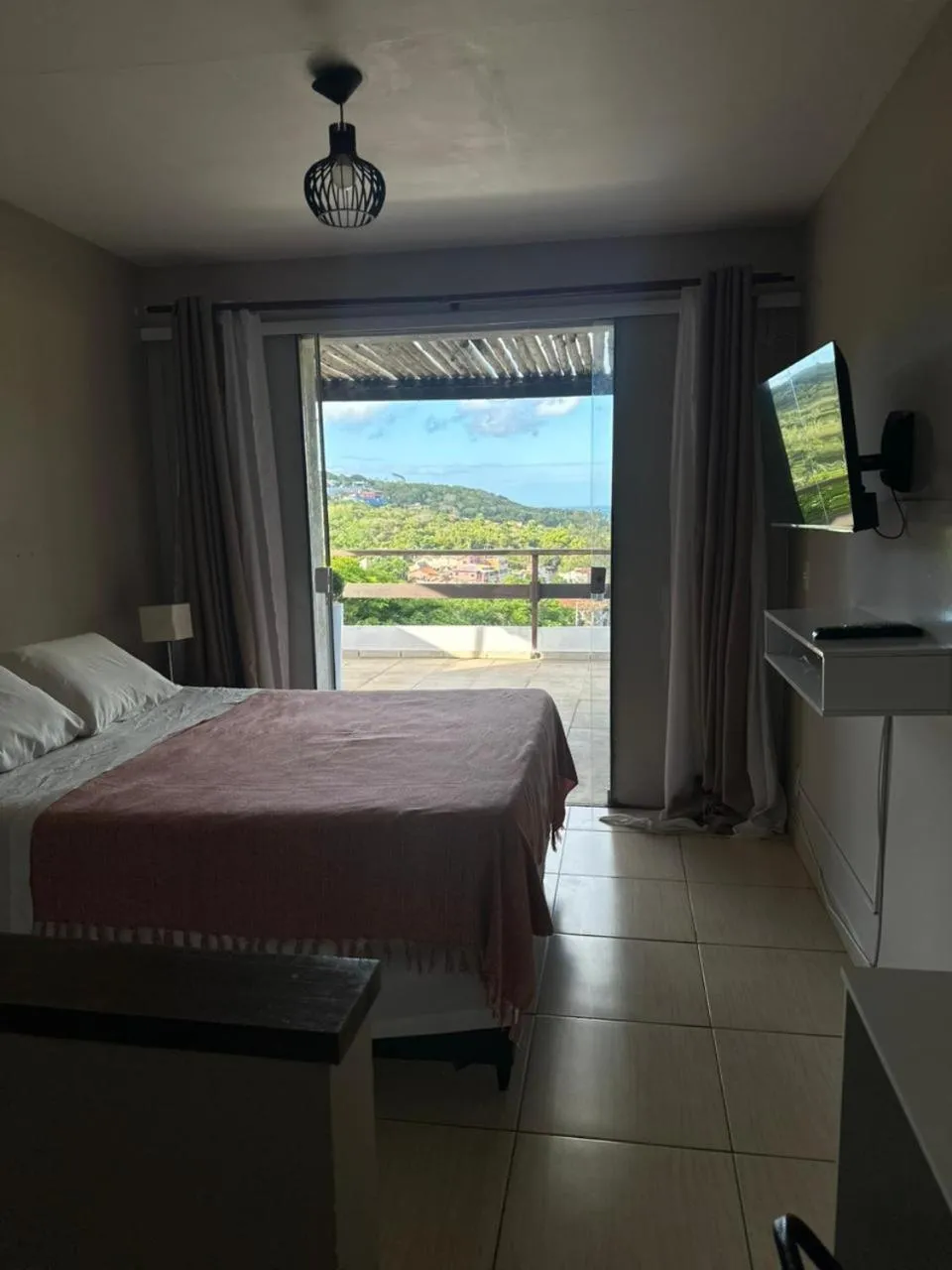 Photo of the whole room, Bed in Pousada Zanzibar