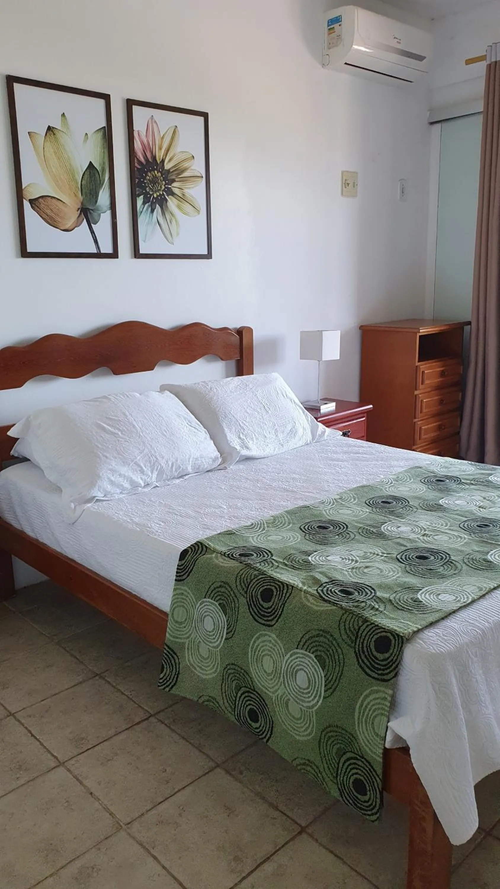 Bed in Pousada Zanzibar