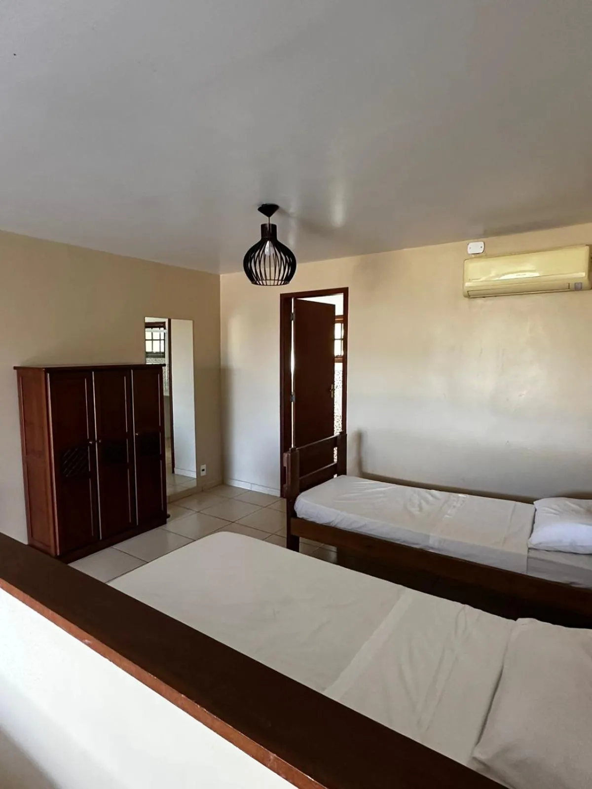 Photo of the whole room, Bed in Pousada Zanzibar