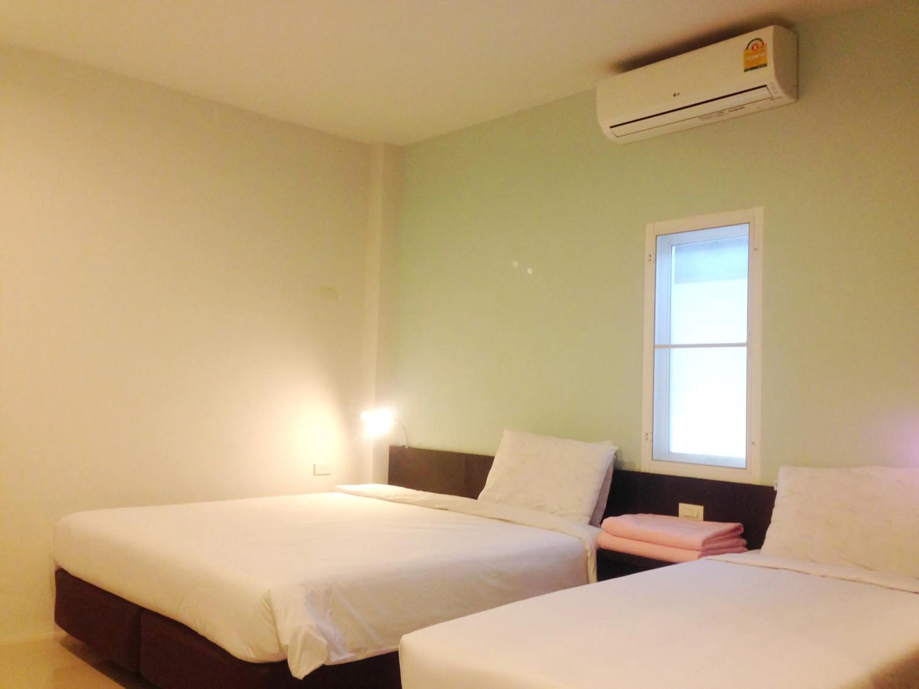 Bed in Chiangrai Green Park Resort