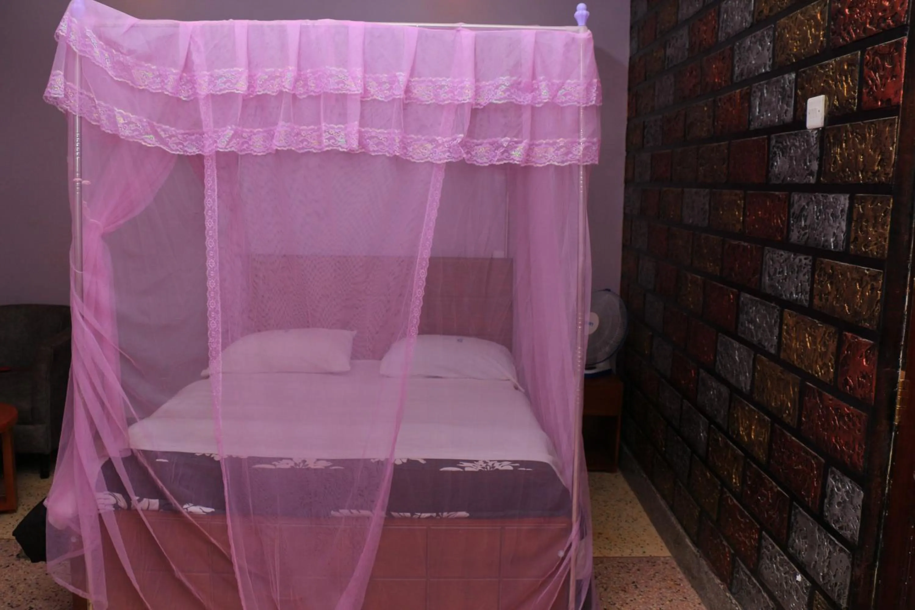 Bed in Marina Terraces Hotel