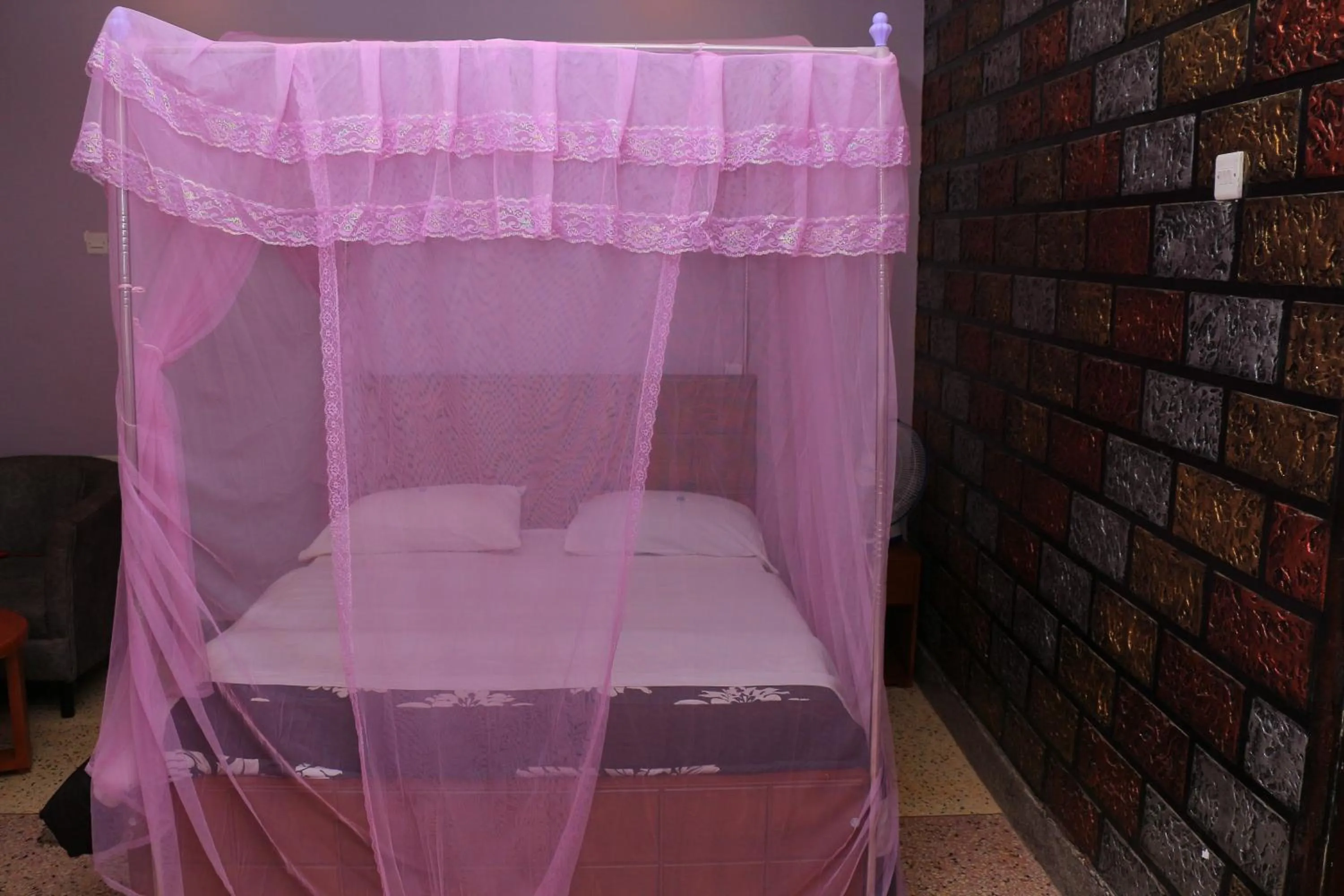 Bed in Marina Terraces Hotel