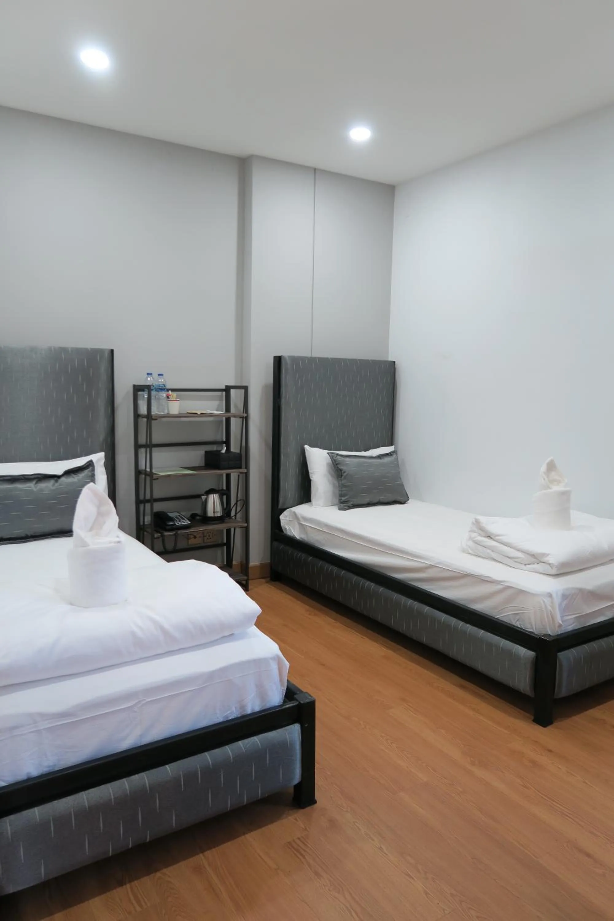 Bed in The Mira Hotel Chiang Rai