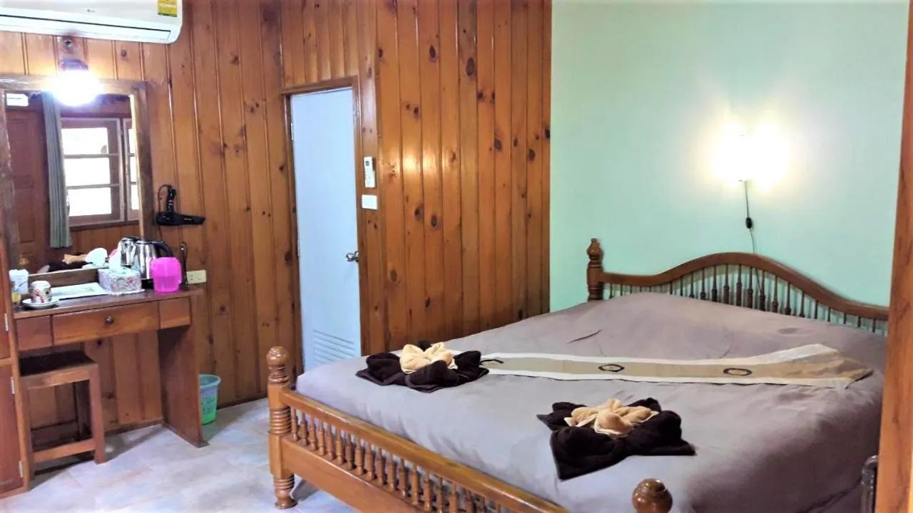 Photo of the whole room, Bed in Huan Chiang Dao Resort
