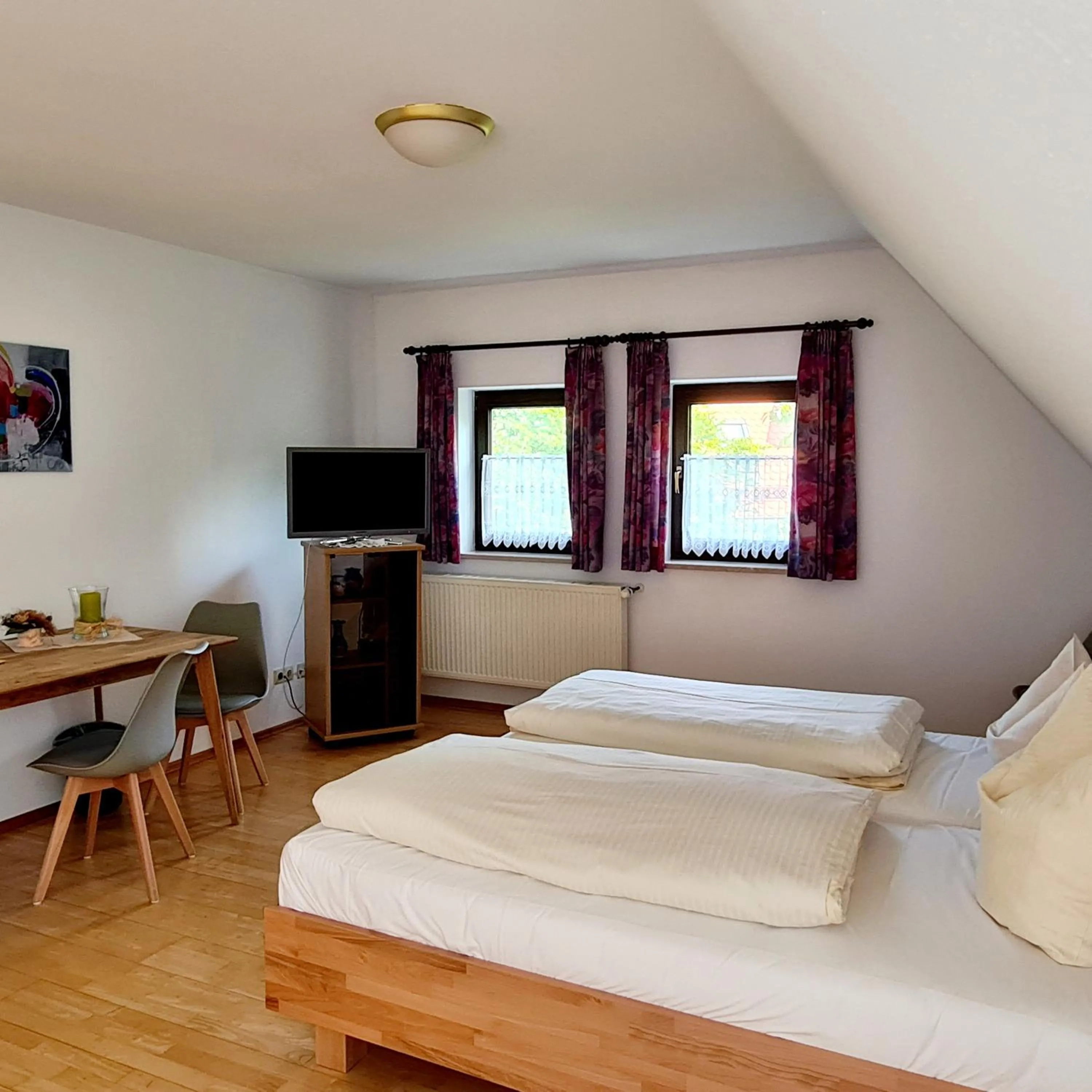 Living room, Bed in Gasthaus Schöllmann