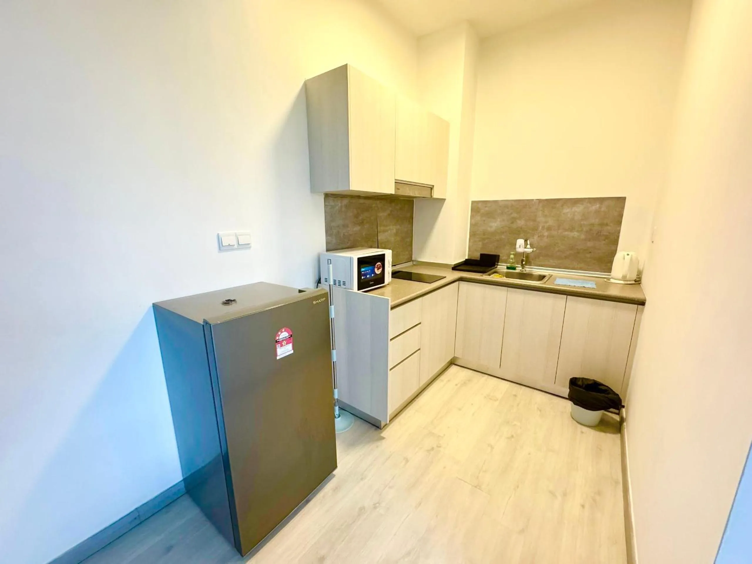 Kitchen or kitchenette in Sunset Seaview Vacation Condos @ Jesselton Quay