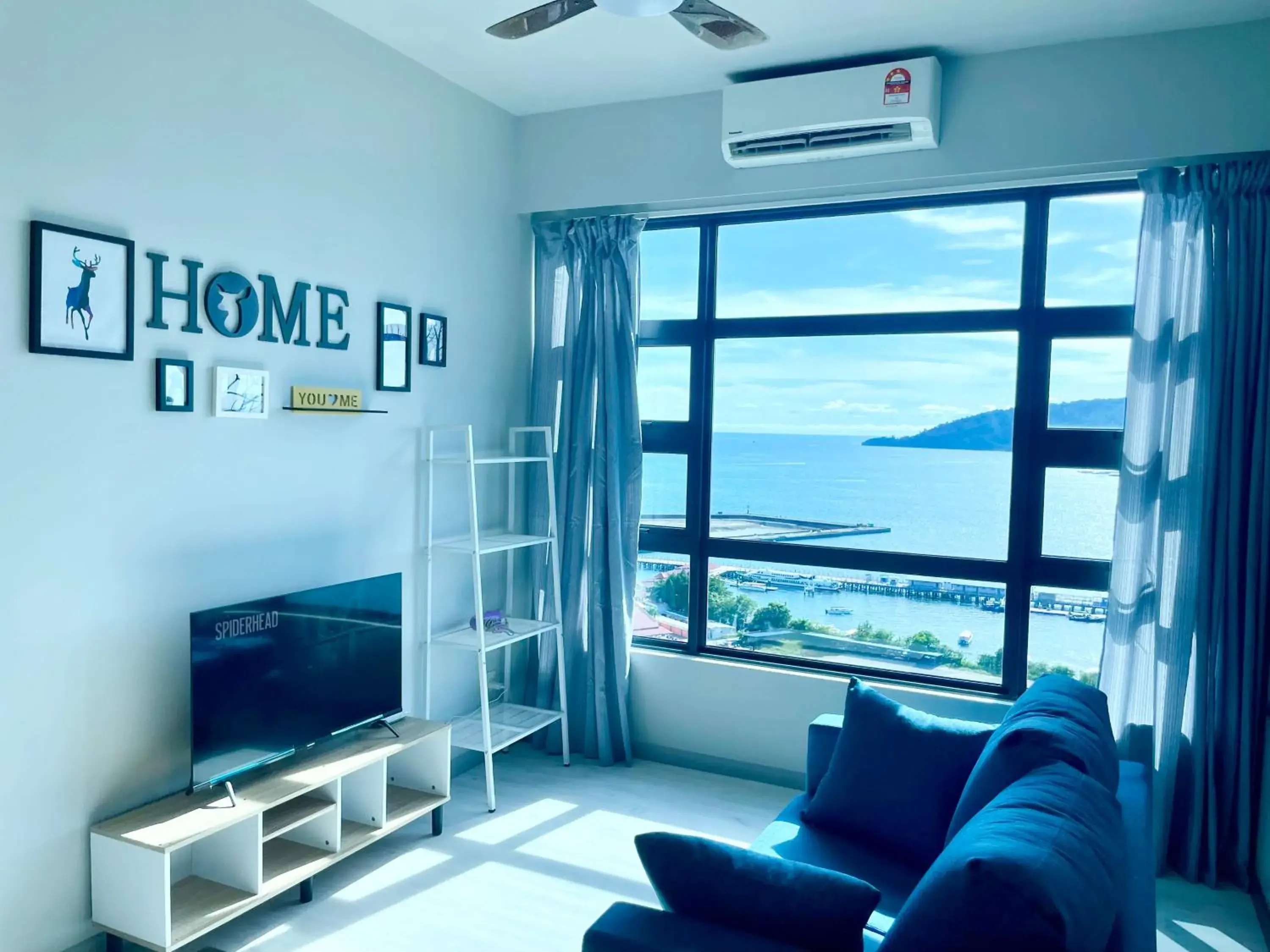 Living room in Sunset Seaview Vacation Condos @ Jesselton Quay Living room in Sunset Seaview Vacation Condos @ Jesselton Quay