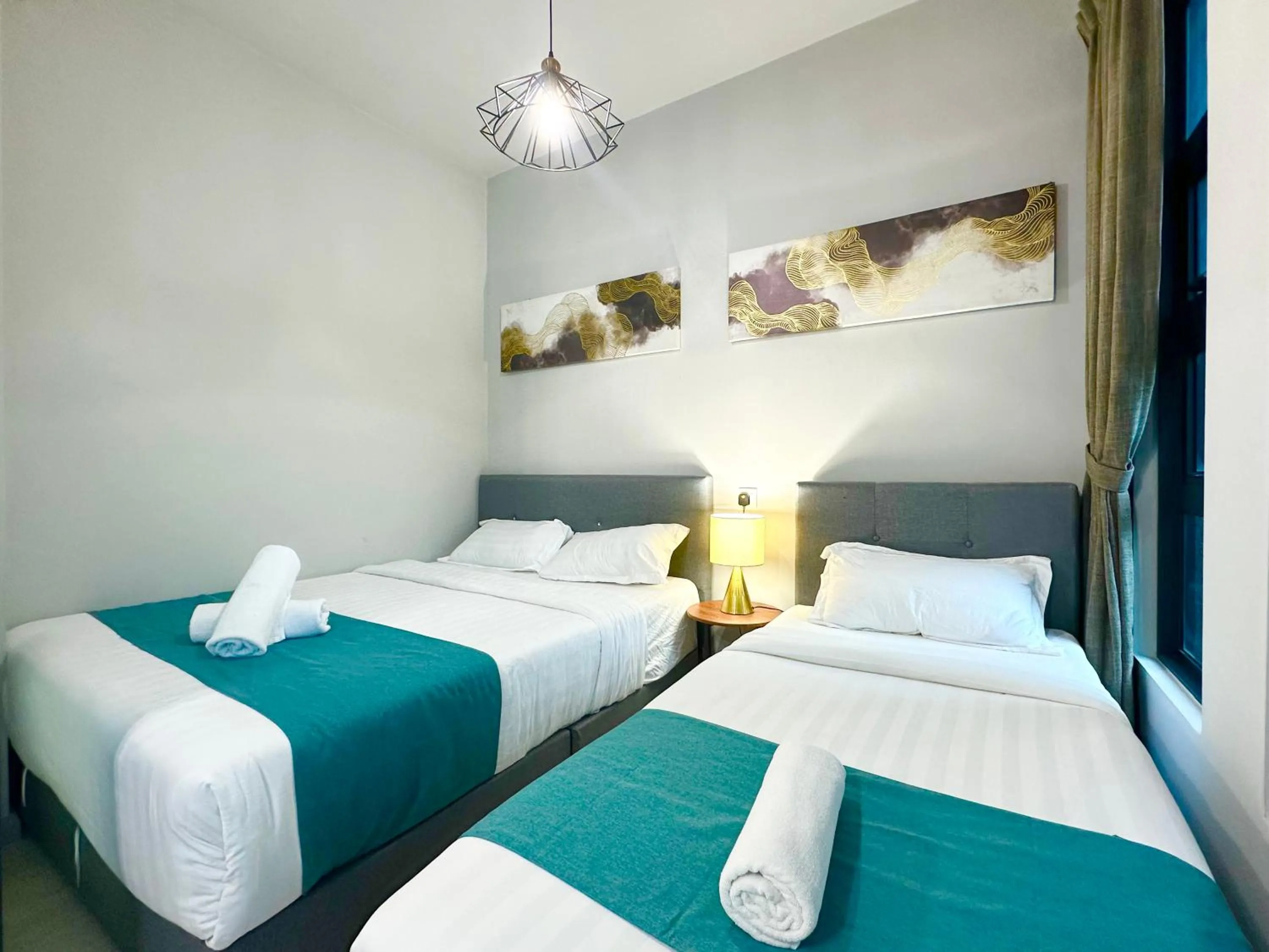 Bed in Sunset Seaview Vacation Condos @ Jesselton Quay