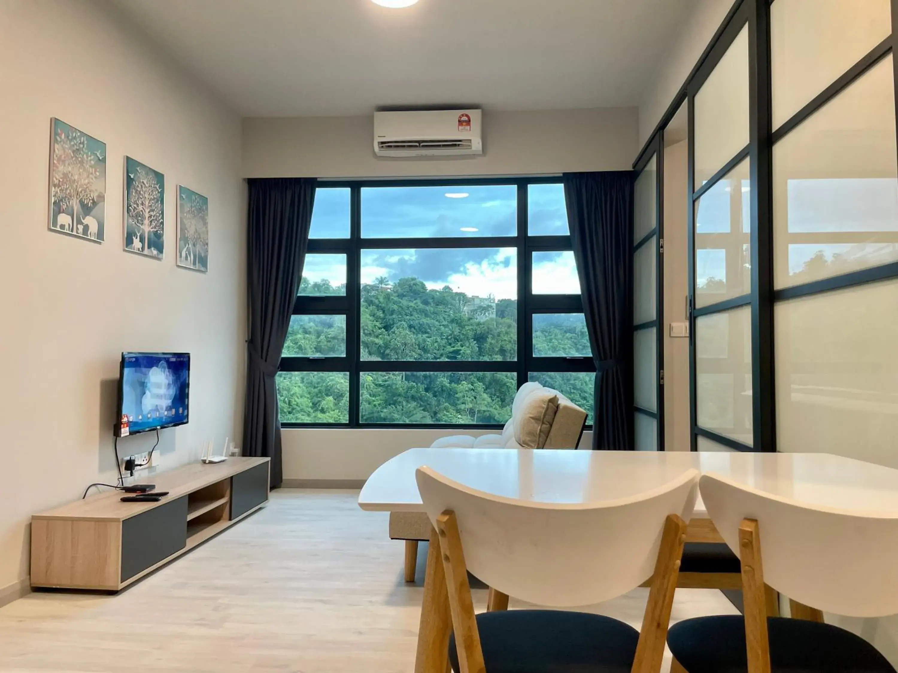 Living room in Sunset Seaview Vacation Condos @ Jesselton Quay Living room in Sunset Seaview Vacation Condos @ Jesselton Quay