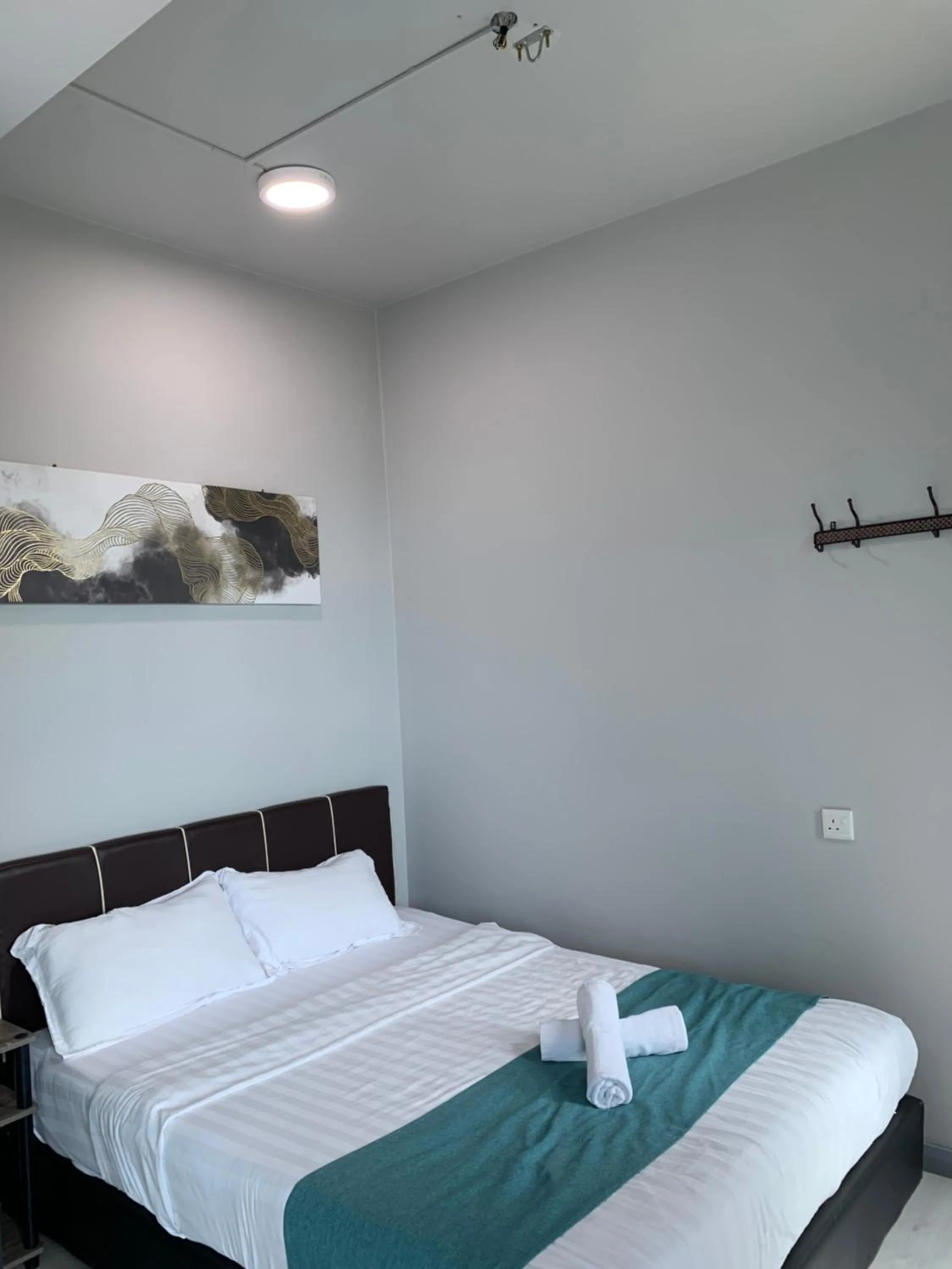 Bed in Sunset Seaview Vacation Condos @ Jesselton Quay